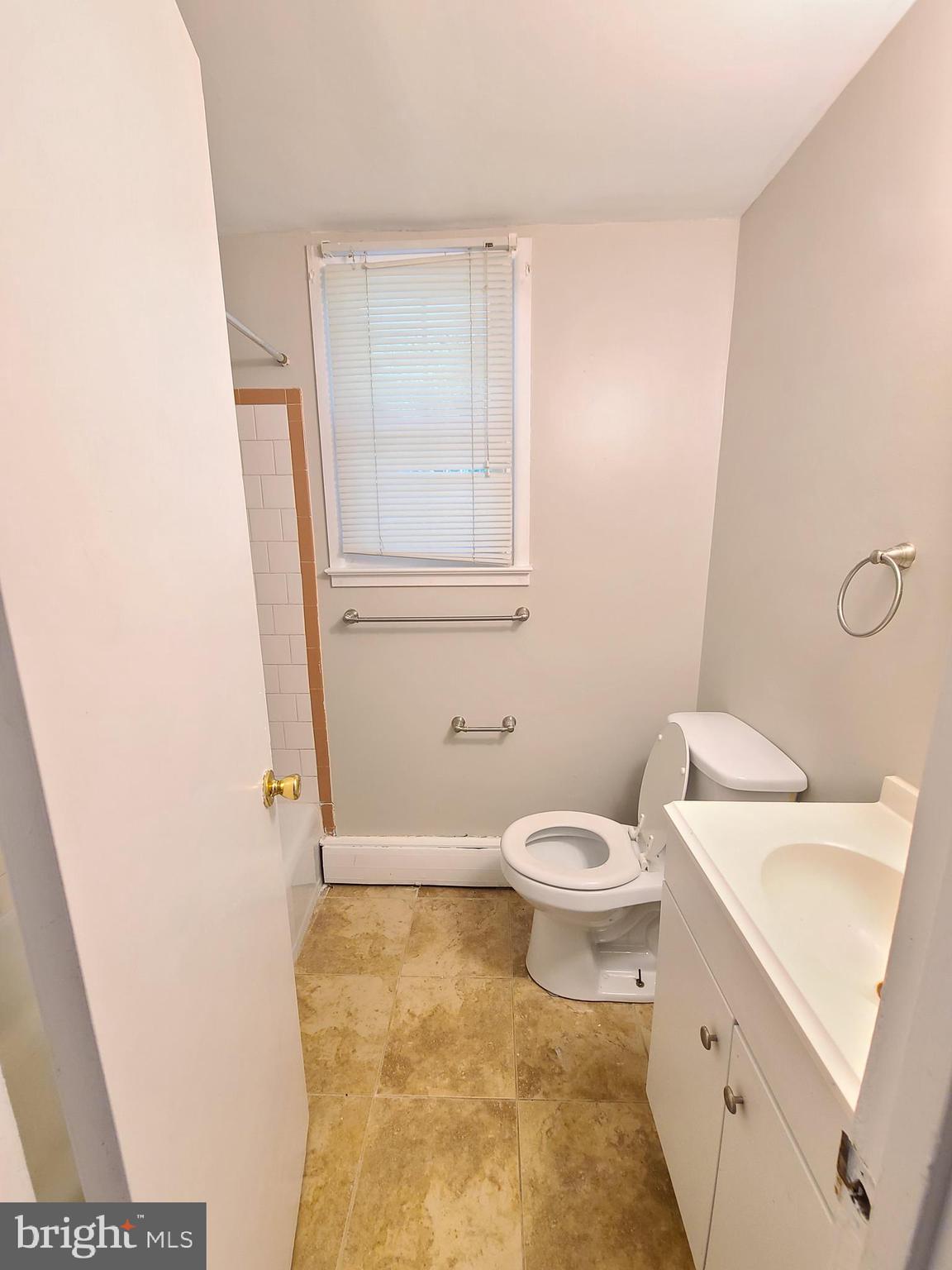 1524 Florida Avenue Woodbridge, VA 22191 - Photo 33 of 36 a bathroom with a toilet sink and a mirror