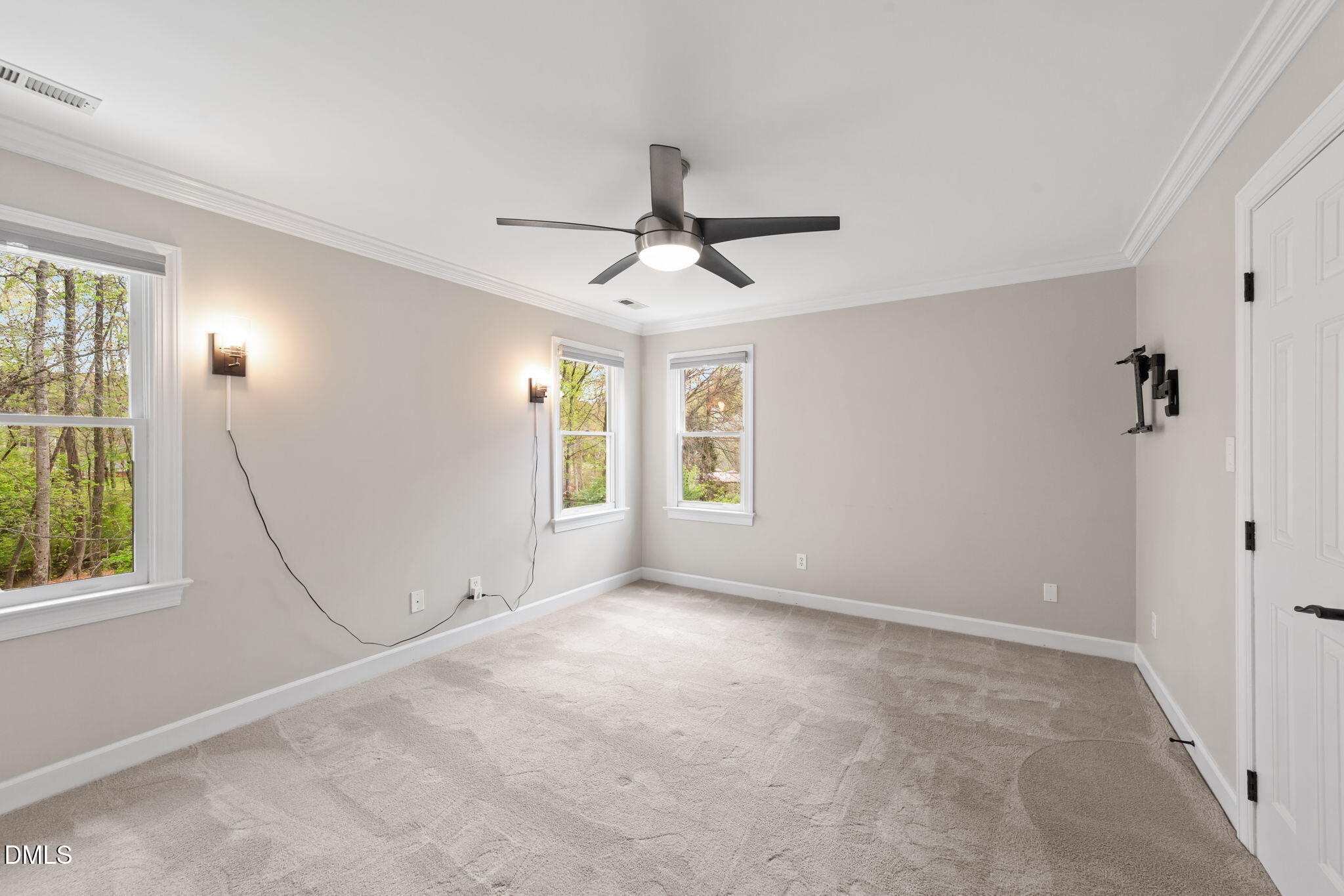 2004 Sassacus Lane Apex, NC 27523 - Photo 19 of 37 a view of a livingroom with a window and a ceiling fan