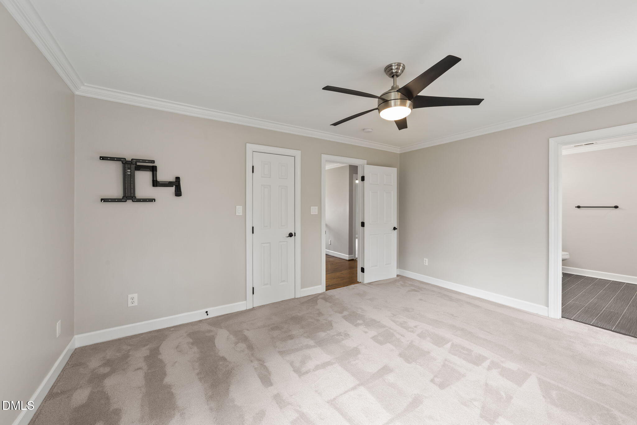 2004 Sassacus Lane Apex, NC 27523 - Photo 20 of 37 a view of a livingroom with a ceiling fan & a ceiling fan