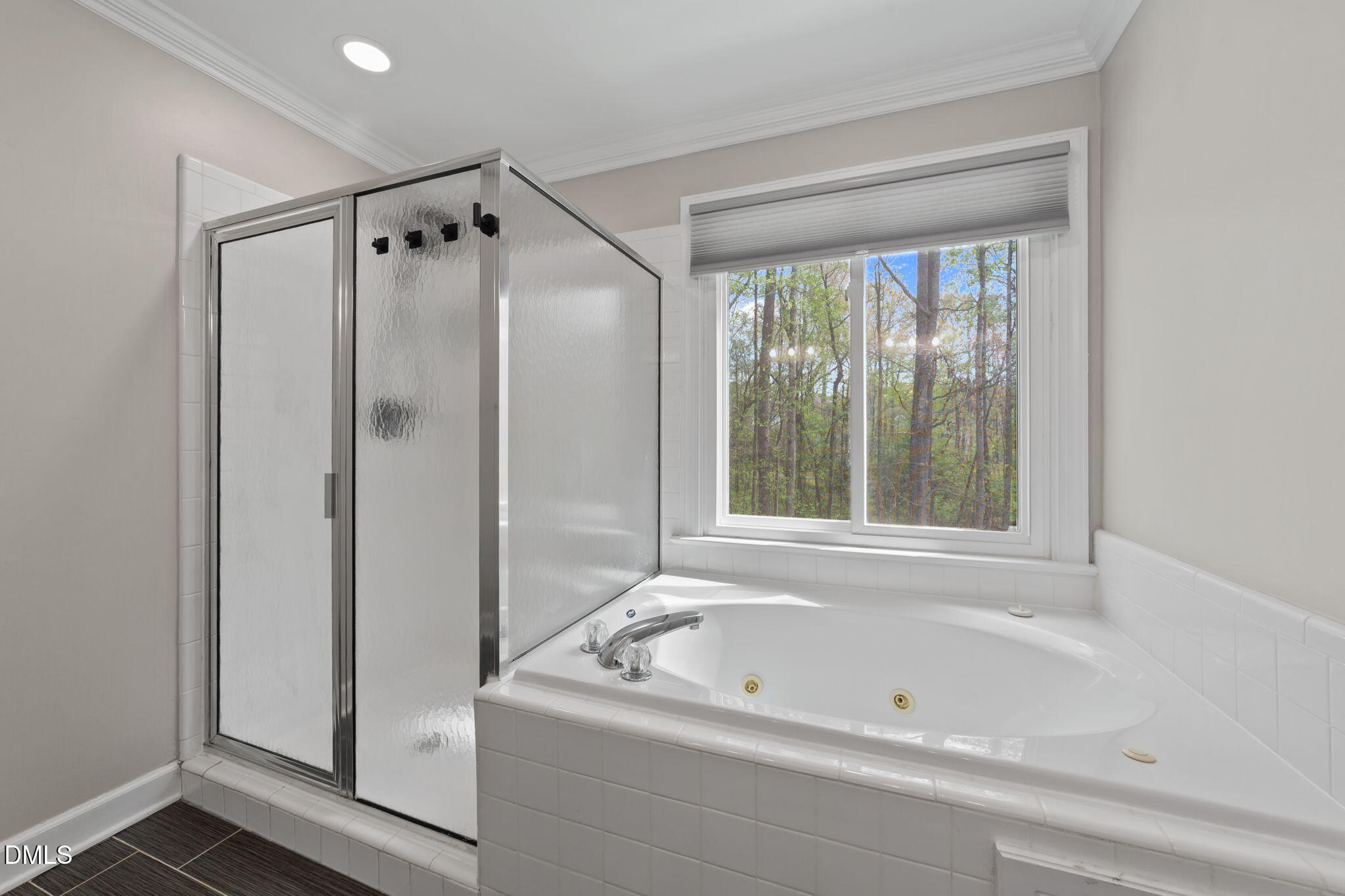 2004 Sassacus Lane Apex, NC 27523 - Photo 23 of 37 a bathroom with a tub shower and a sink