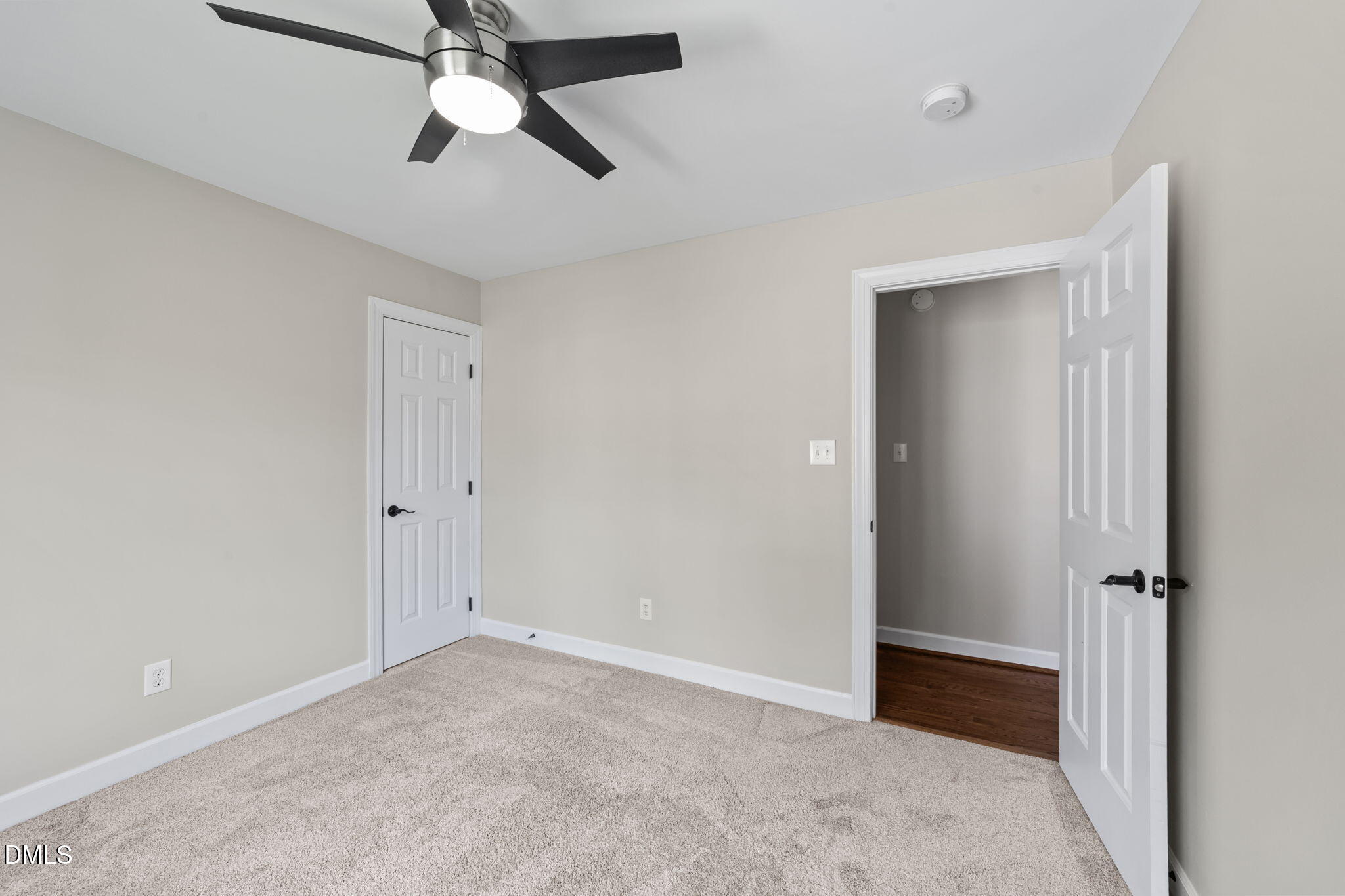 2004 Sassacus Lane Apex, NC 27523 - Photo 28 of 37 a view of an empty room and chandelier fan