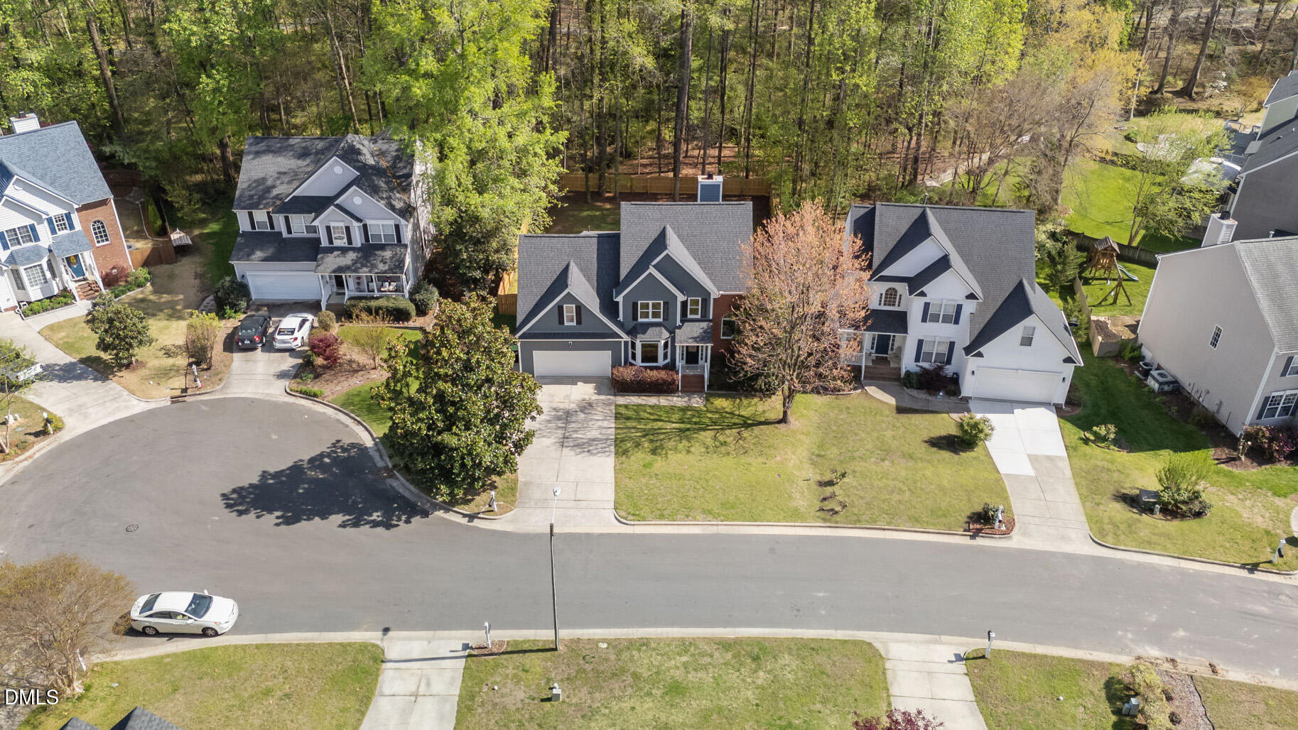 2004 Sassacus Lane Apex, NC 27523 - Photo 2 of 37 an aerial view of residential houses with outdoor space