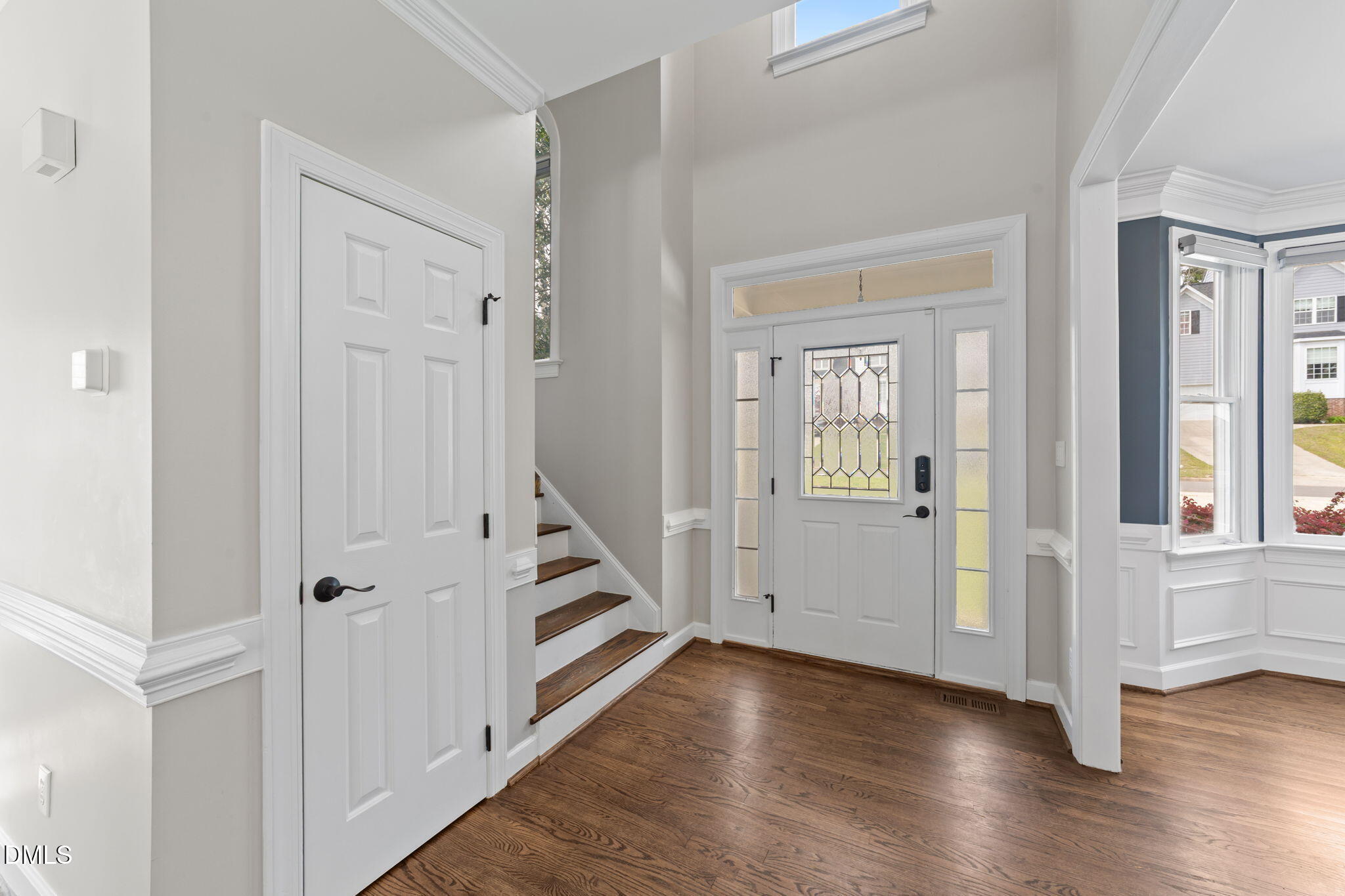 2004 Sassacus Lane Apex, NC 27523 - Photo 5 of 37 a view of a hallway with wooden floor and entryway
