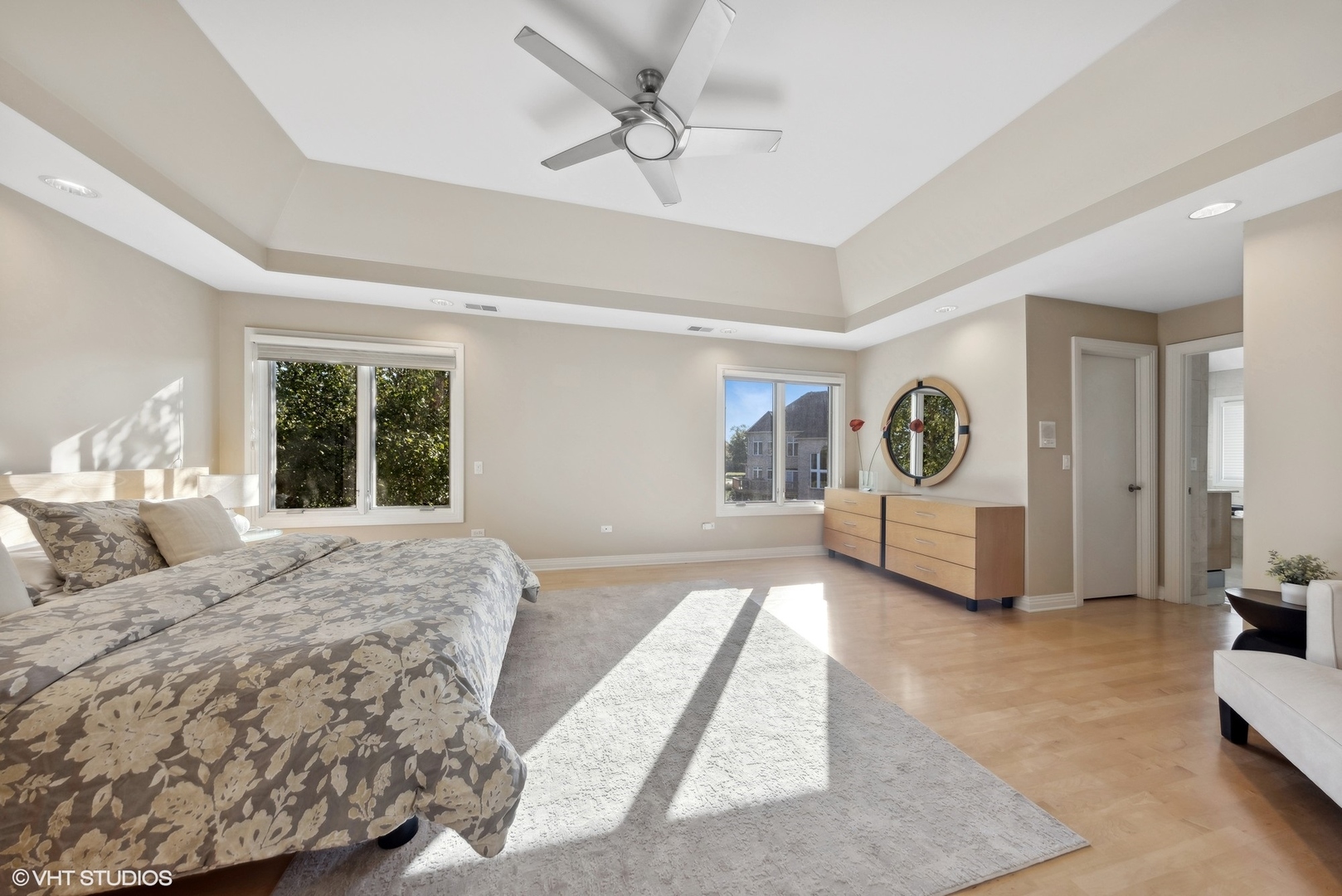 6885 Fieldstone Drive Burr Ridge, IL 60527 - Photo 17 of 37 a spacious bedroom with a large bed and a window