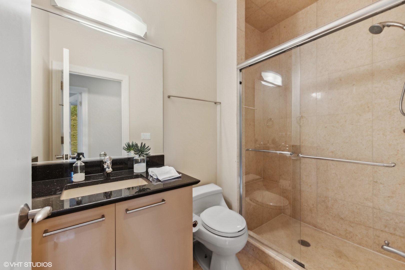 6885 Fieldstone Drive Burr Ridge, IL 60527 - Photo 25 of 37 a bathroom with a granite countertop sink toilet and shower