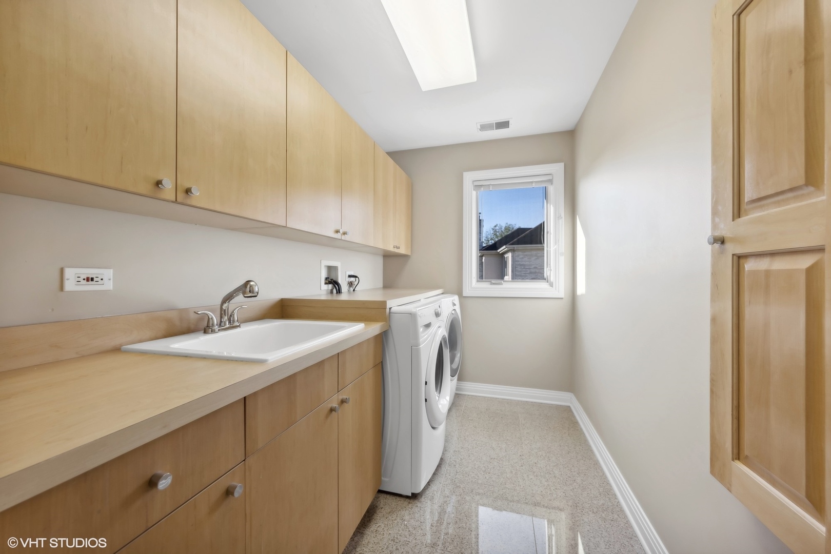 6885 Fieldstone Drive Burr Ridge, IL 60527 - Photo 26 of 37 a utility room with cabinets washer and dryer