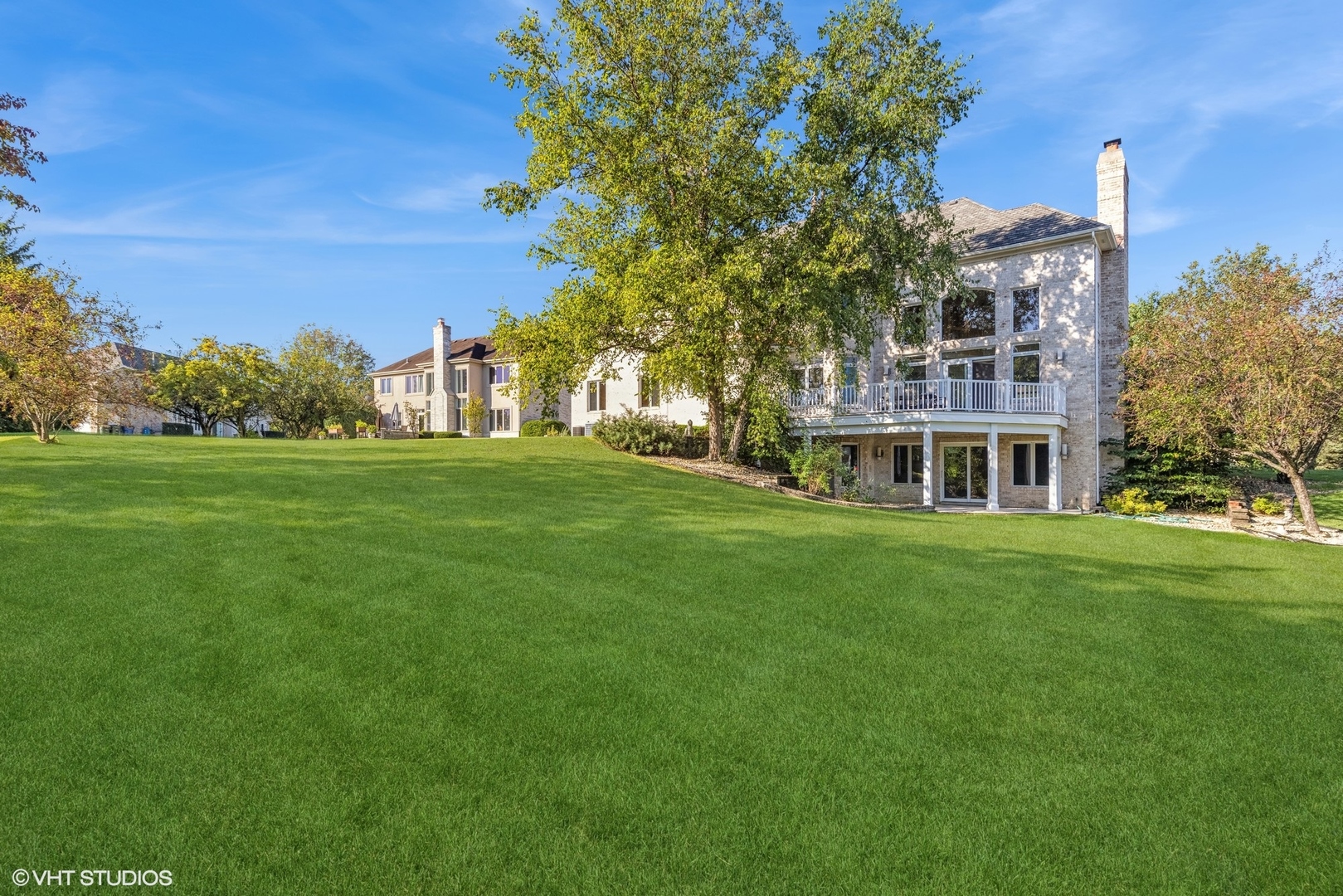 6885 Fieldstone Drive Burr Ridge, IL 60527 - Photo 34 of 37 a view of a building with a yard