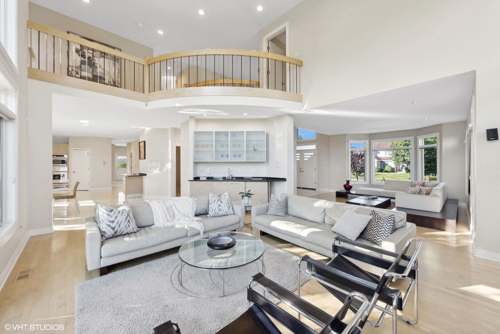 6885 Fieldstone Drive Burr Ridge, IL 60527 - Photo 7 of 37 a living room with furniture and a table