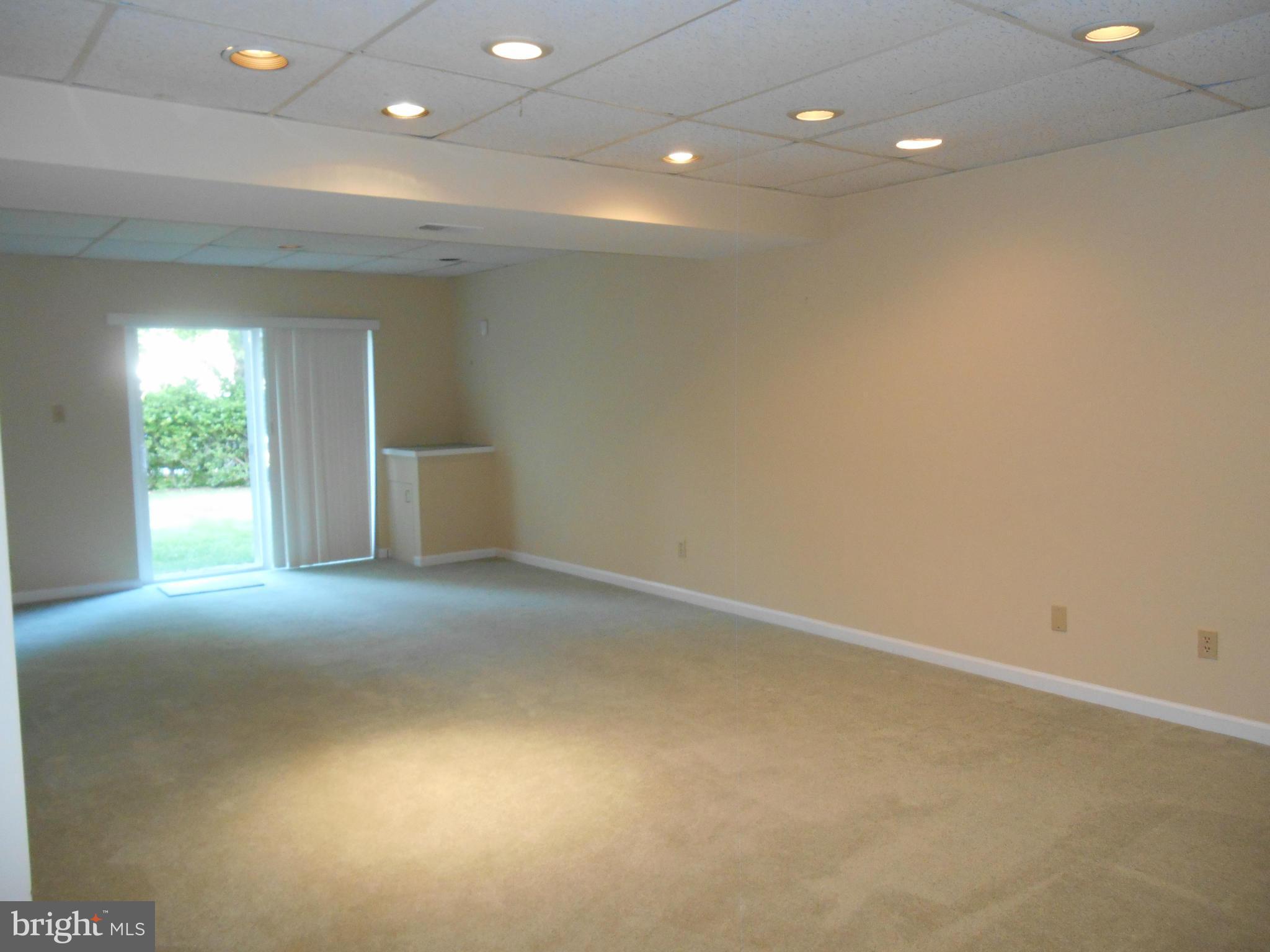211 Hunters Ridge Road Lutherville-Timonium, MD 21093 - Photo 21 of 27 large Basement w sliders and lots of storage