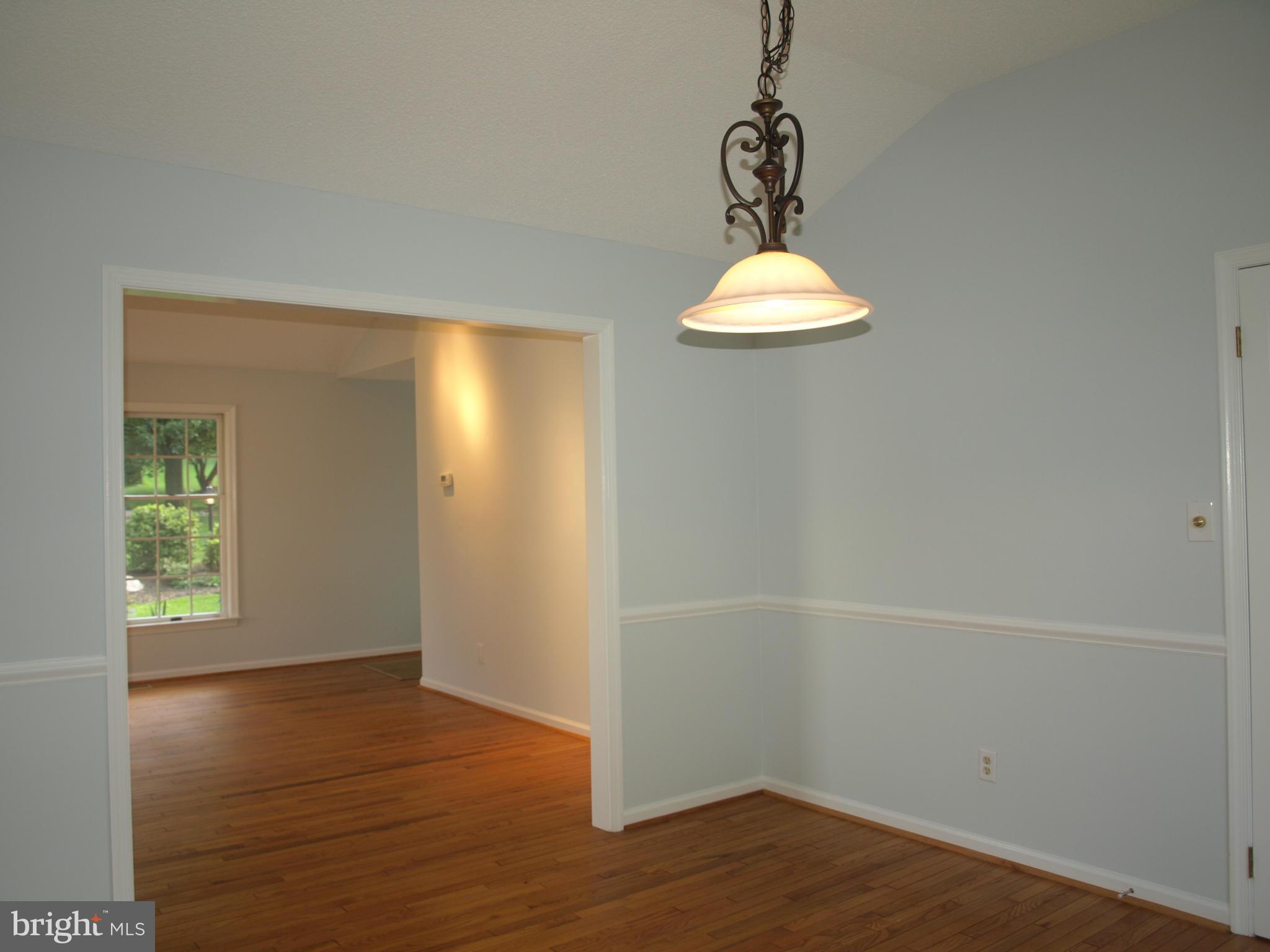 211 Hunters Ridge Road Lutherville-Timonium, MD 21093 - Photo 6 of 27 Dining Room with vaulted ceilings