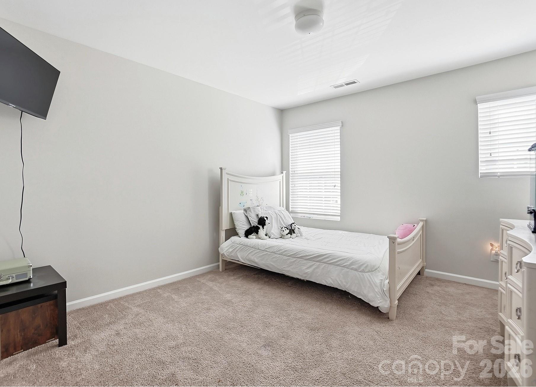 2009 Houndscroft Road Indian Trail, NC 28079 - Photo 13 of 25 a room with a bed and a window