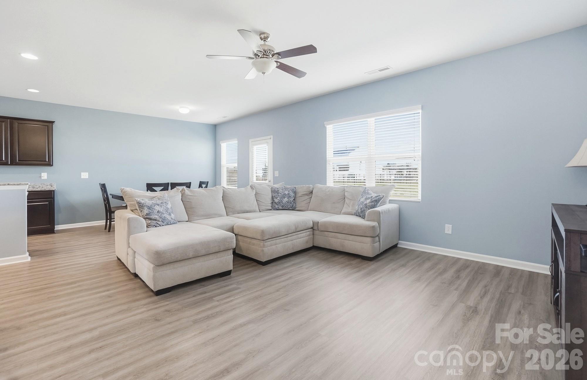 2009 Houndscroft Road Indian Trail, NC 28079 - Photo 8 of 25 a living room with furniture and a wooden floor