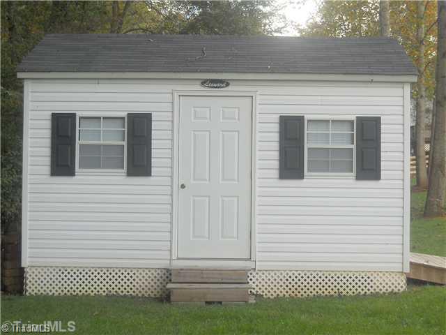 7505 Kristen Drive Oak Ridge, NC 27310 - Photo 13 of 16 Exterior Front.