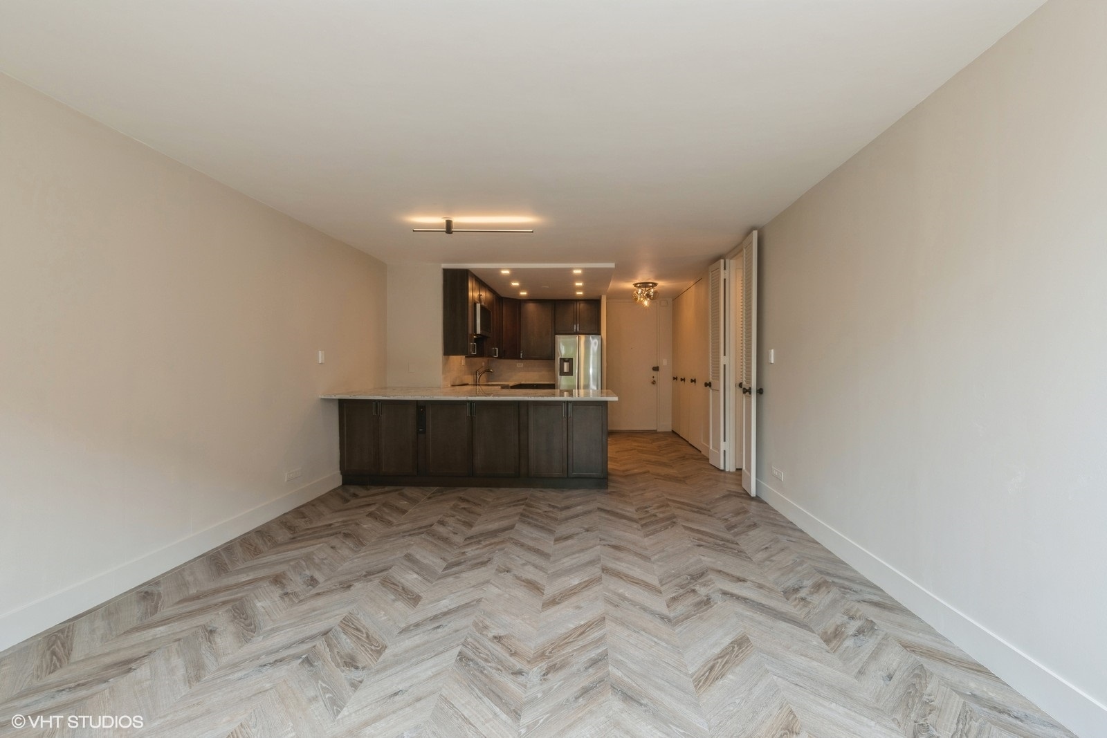 720 West Gordon Terrace, Unit 4M Chicago, IL 60613 - Photo 6 of 10 a view of a kitchen with a sink and cabinets