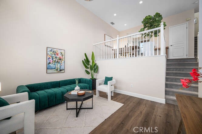 46 Hinterland Way Ladera Ranch, CA 92694 - Photo 2 of 46 a living room with furniture and a potted plant