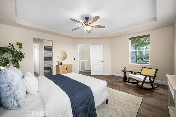 46 Hinterland Way Ladera Ranch, CA 92694 - Photo 24 of 46 a bedroom with a bed and a chandelier