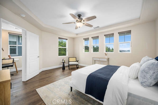 46 Hinterland Way Ladera Ranch, CA 92694 - Photo 25 of 46 a bedroom with a bed and wooden floor