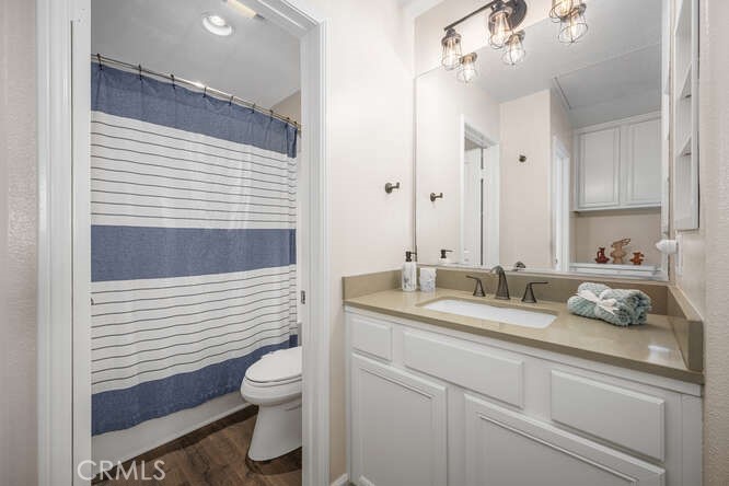 46 Hinterland Way Ladera Ranch, CA 92694 - Photo 26 of 46 a bathroom with a granite countertop sink mirror and toilet