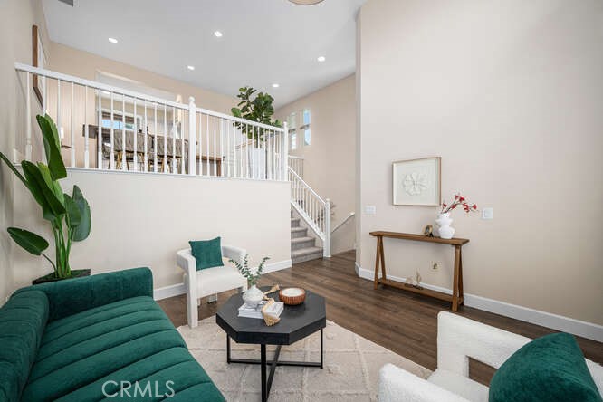 46 Hinterland Way Ladera Ranch, CA 92694 - Photo 3 of 46 a living room with furniture and a wooden floor