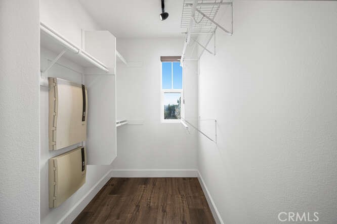46 Hinterland Way Ladera Ranch, CA 92694 - Photo 31 of 46 a view of hallway with wooden floor and staircase