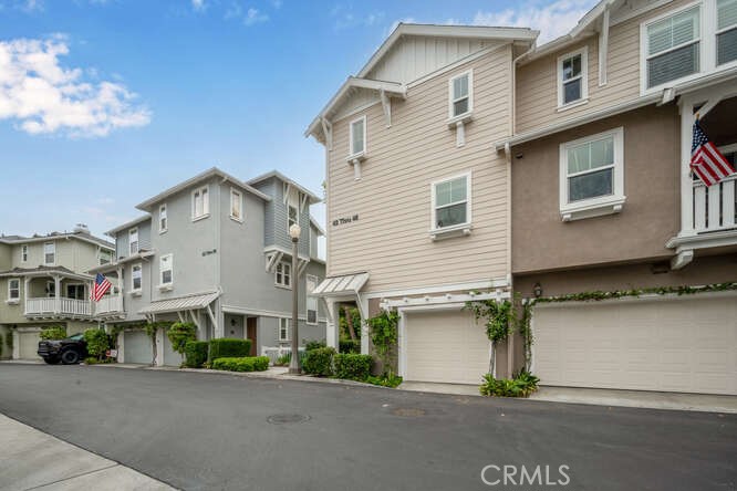46 Hinterland Way Ladera Ranch, CA 92694 - Photo 45 of 46 a view of a white building among the street with palm trees