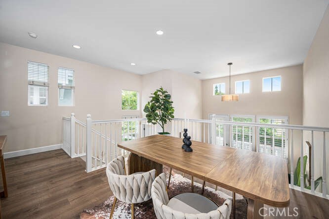 46 Hinterland Way Ladera Ranch, CA 92694 - Photo 8 of 46 a view of a dining room with furniture and wooden floor