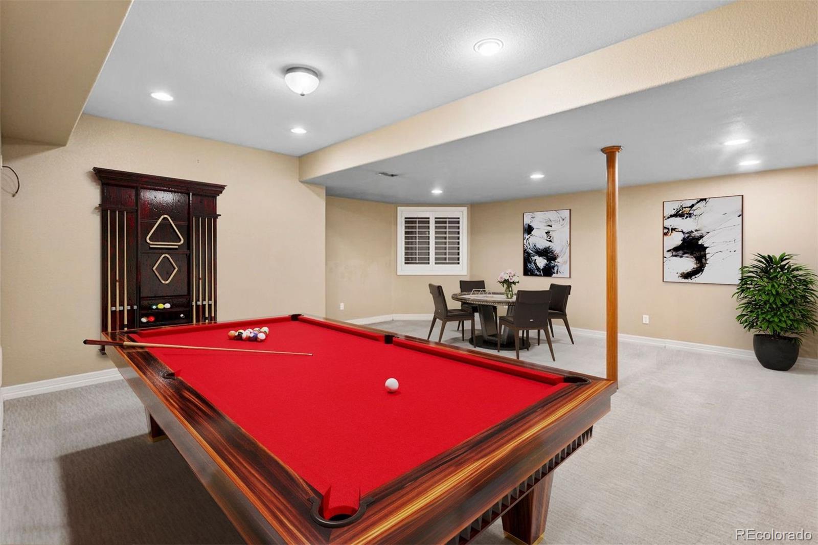 7125 Polo Ridge Drive Littleton, CO 80128 - Photo 16 of 25 a room with pool table and windows