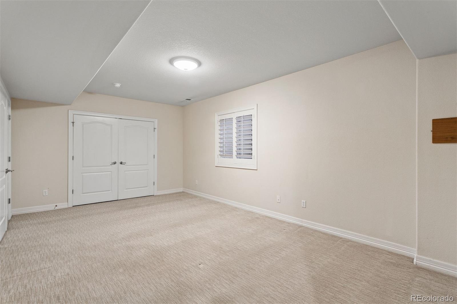 7125 Polo Ridge Drive Littleton, CO 80128 - Photo 22 of 25 a view of an empty room