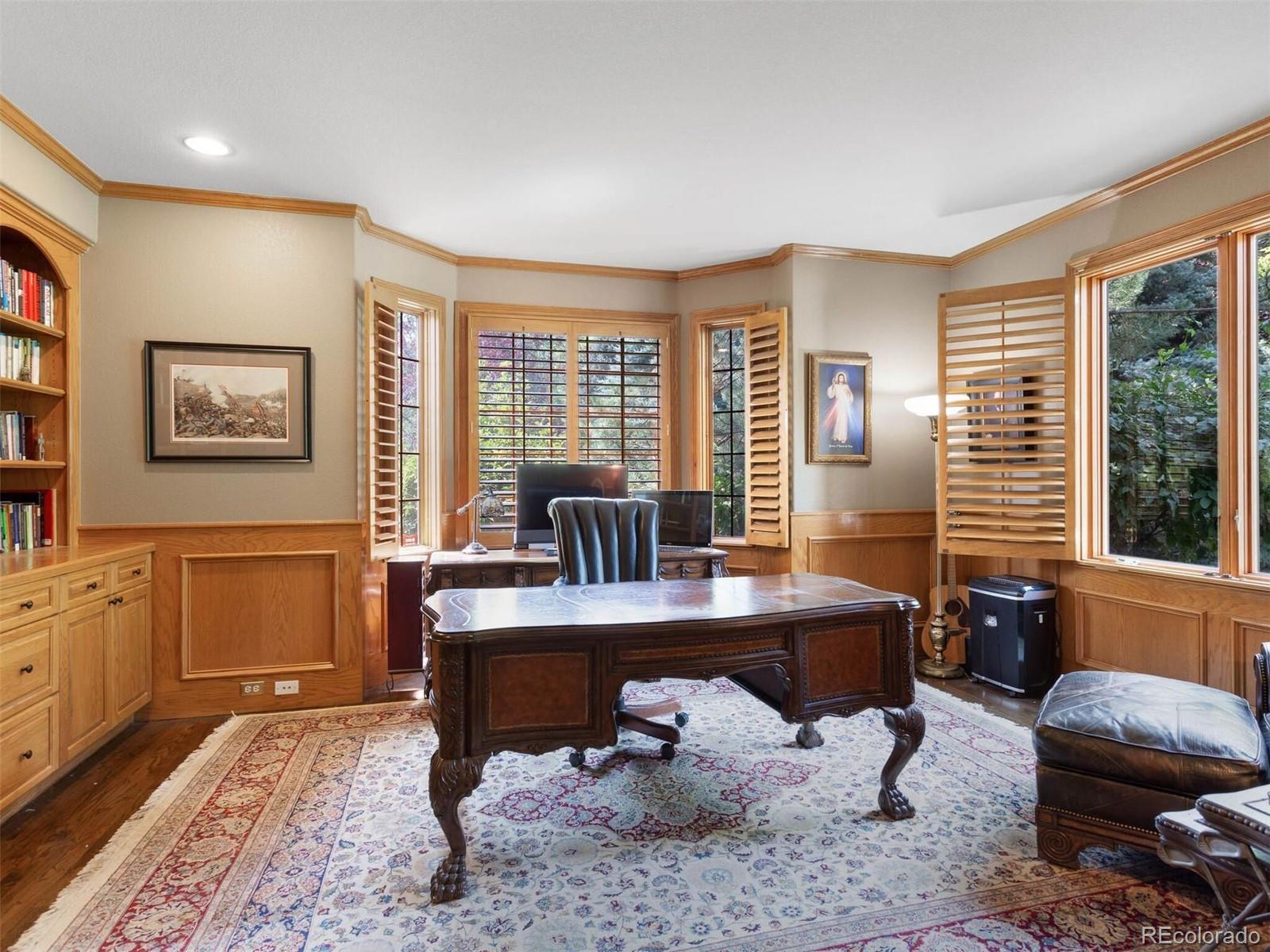 7125 Polo Ridge Drive Littleton, CO 80128 - Photo 9 of 25 a work room with furniture and windows