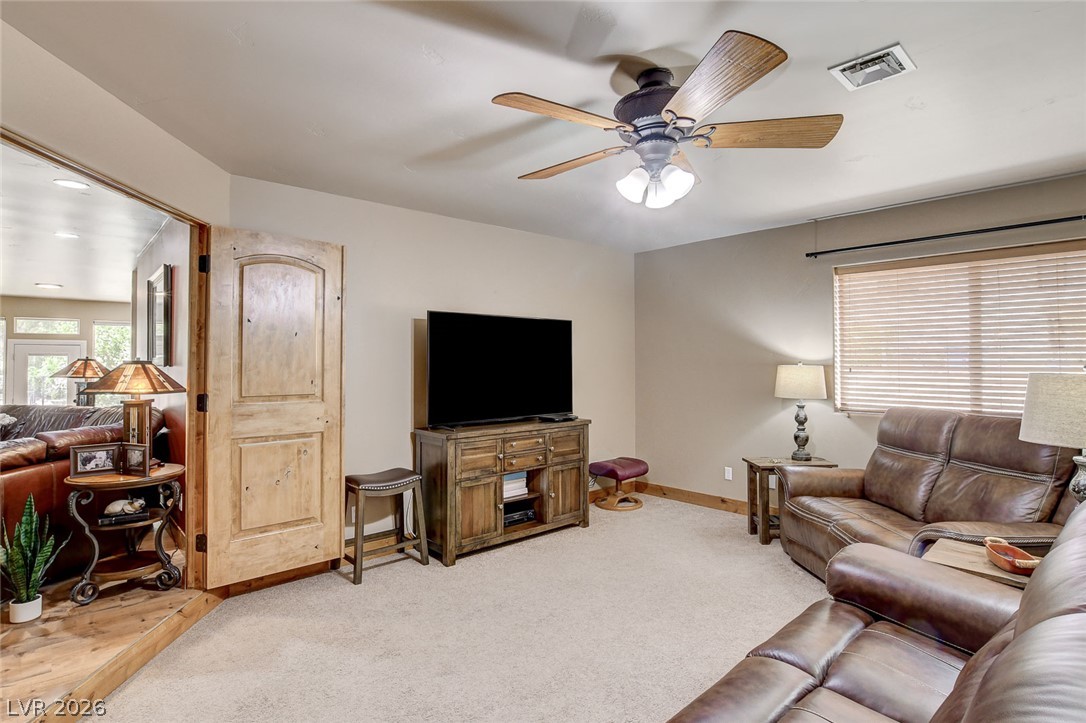 1950 Bowman Road Logandale, NV 89021 - Photo 26 of 81 A well-lit family room offers comfortable seating and a convenient media center.