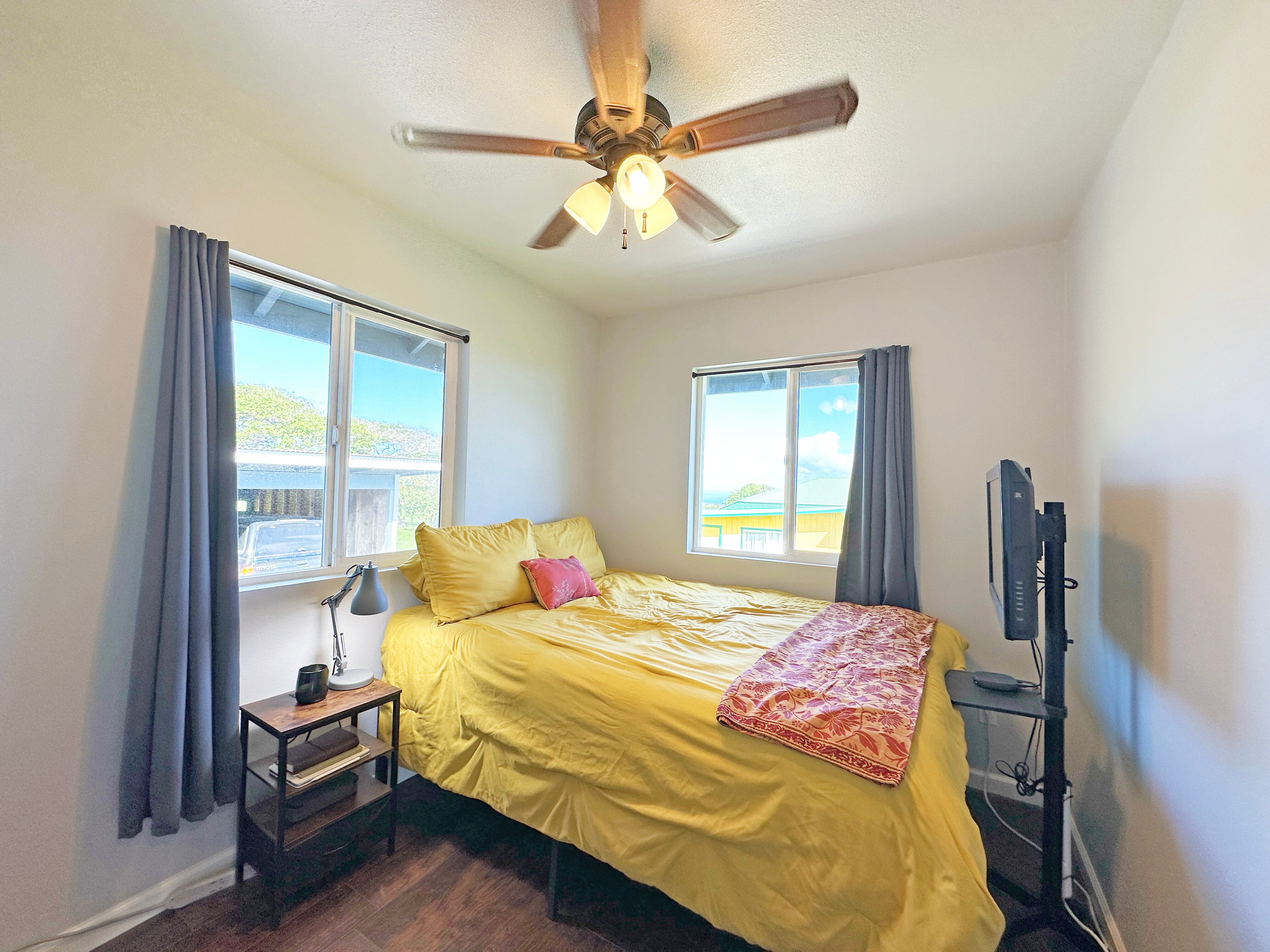 54-2461 Kynnersley Road Kapaau, HI 96755 - Photo 26 of 30 a bedroom with a bed and a window