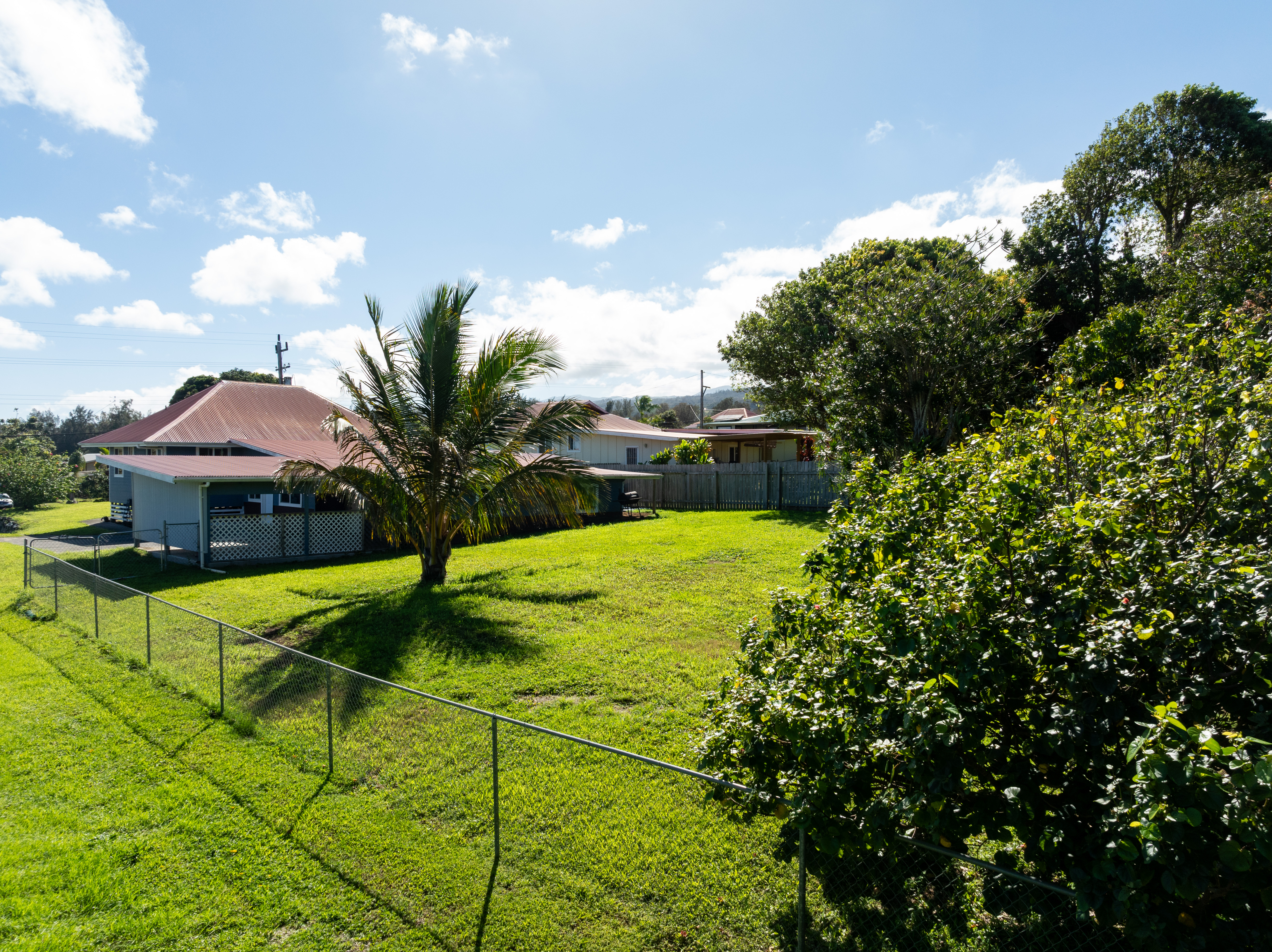 54-2461 Kynnersley Road Kapaau, HI 96755 - Photo 27 of 30 a swimming pool with outdoor seating and yard
