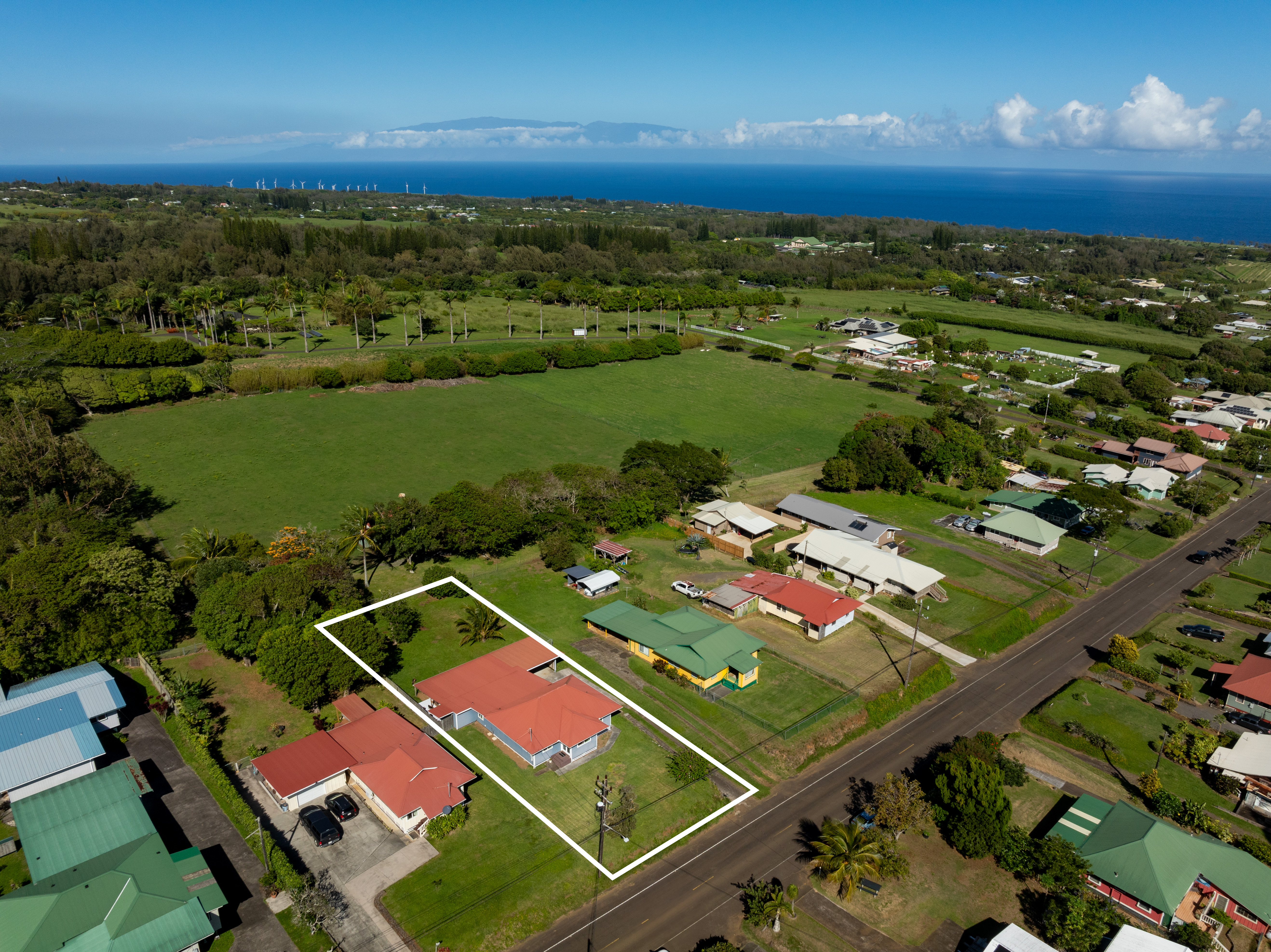54-2461 Kynnersley Road Kapaau, HI 96755 - Photo 5 of 30 an aerial view of a pool a yard patio swimming pool and outdoor seating