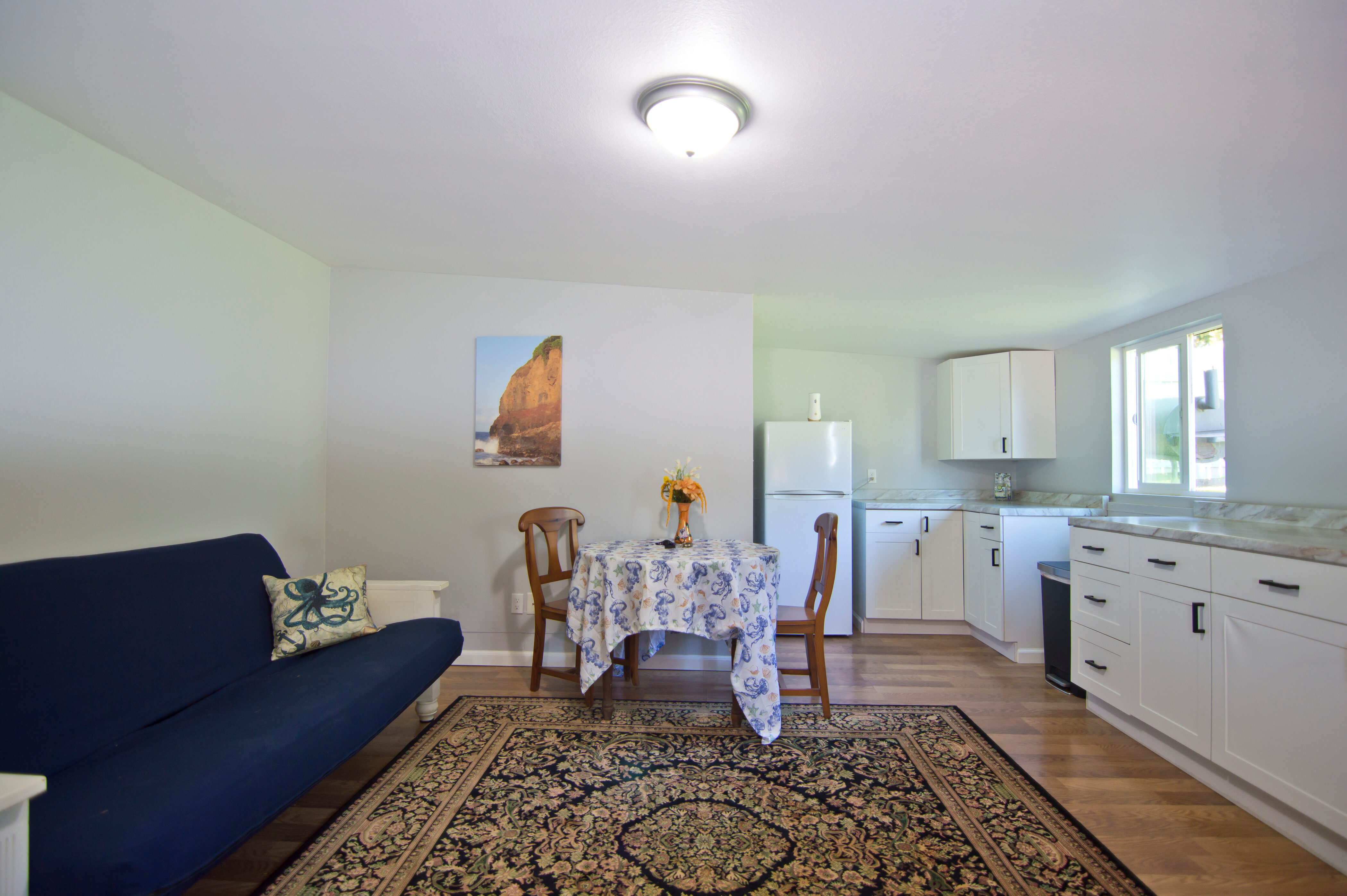 54-2461 Kynnersley Road Kapaau, HI 96755 - Photo 9 of 30 a living room with furniture and wooden floor