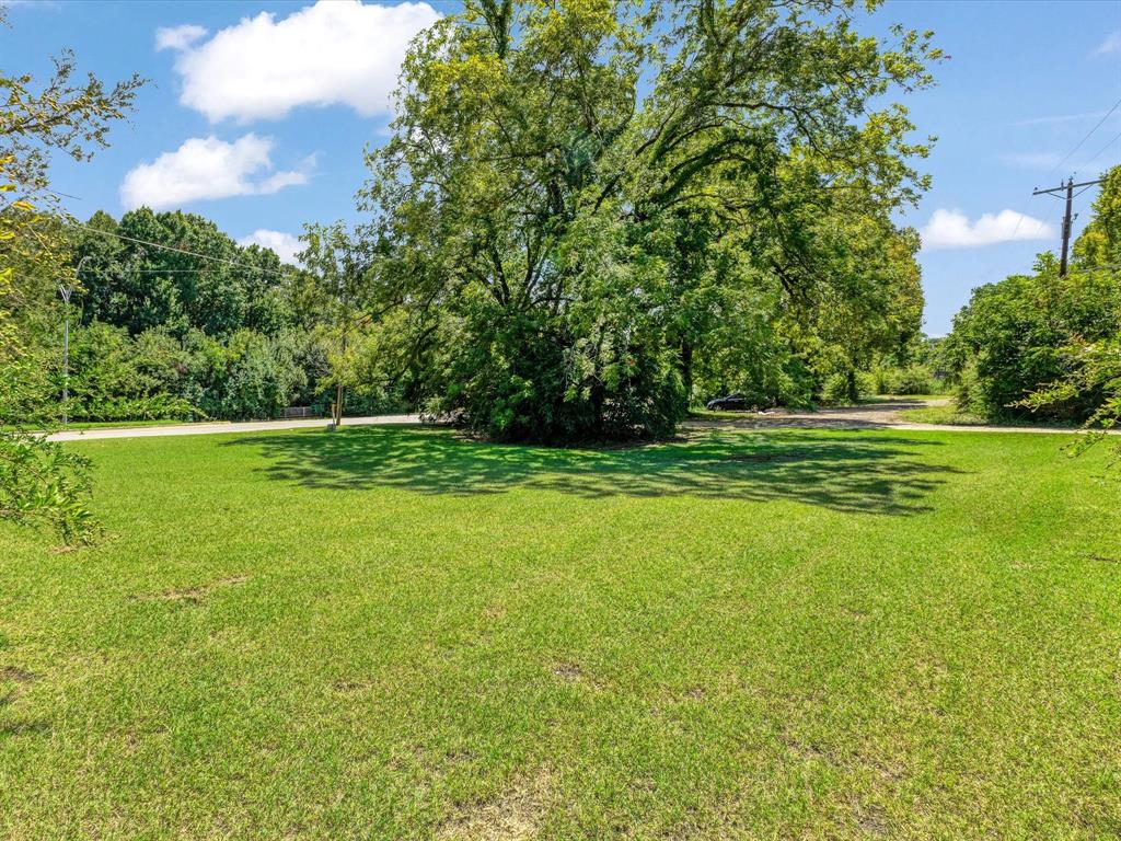 2901 Simpson Stuart Road Dallas, TX 75241 - Photo 3 of 14 a view of outdoor space with deck and green space