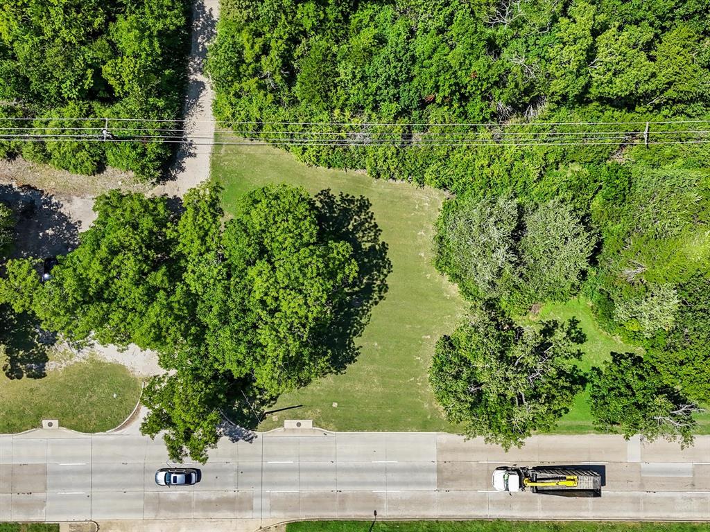 2901 Simpson Stuart Road Dallas, TX 75241 - Photo 5 of 14 an aerial view of residential house with outdoor space and trees all around