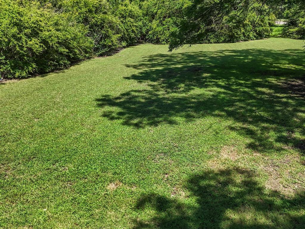 2901 Simpson Stuart Road Dallas, TX 75241 - Photo 7 of 14 a view of a trees with a yard