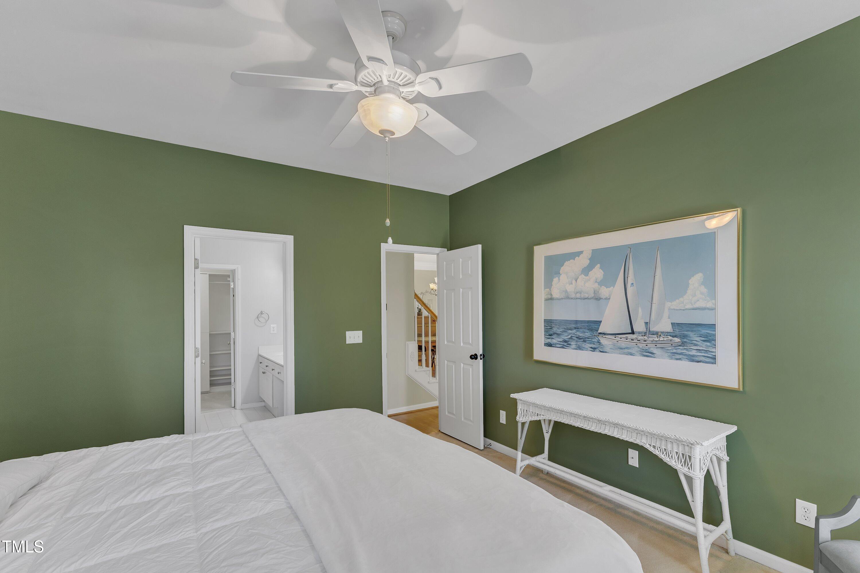 1201 Red Beech Court Raleigh, NC 27614 - Photo 20 of 41 Primary bedroom, with windows facing the pond