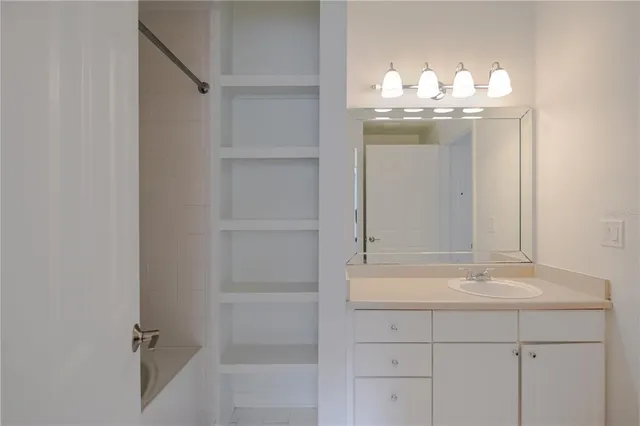 a bathroom with a mirror