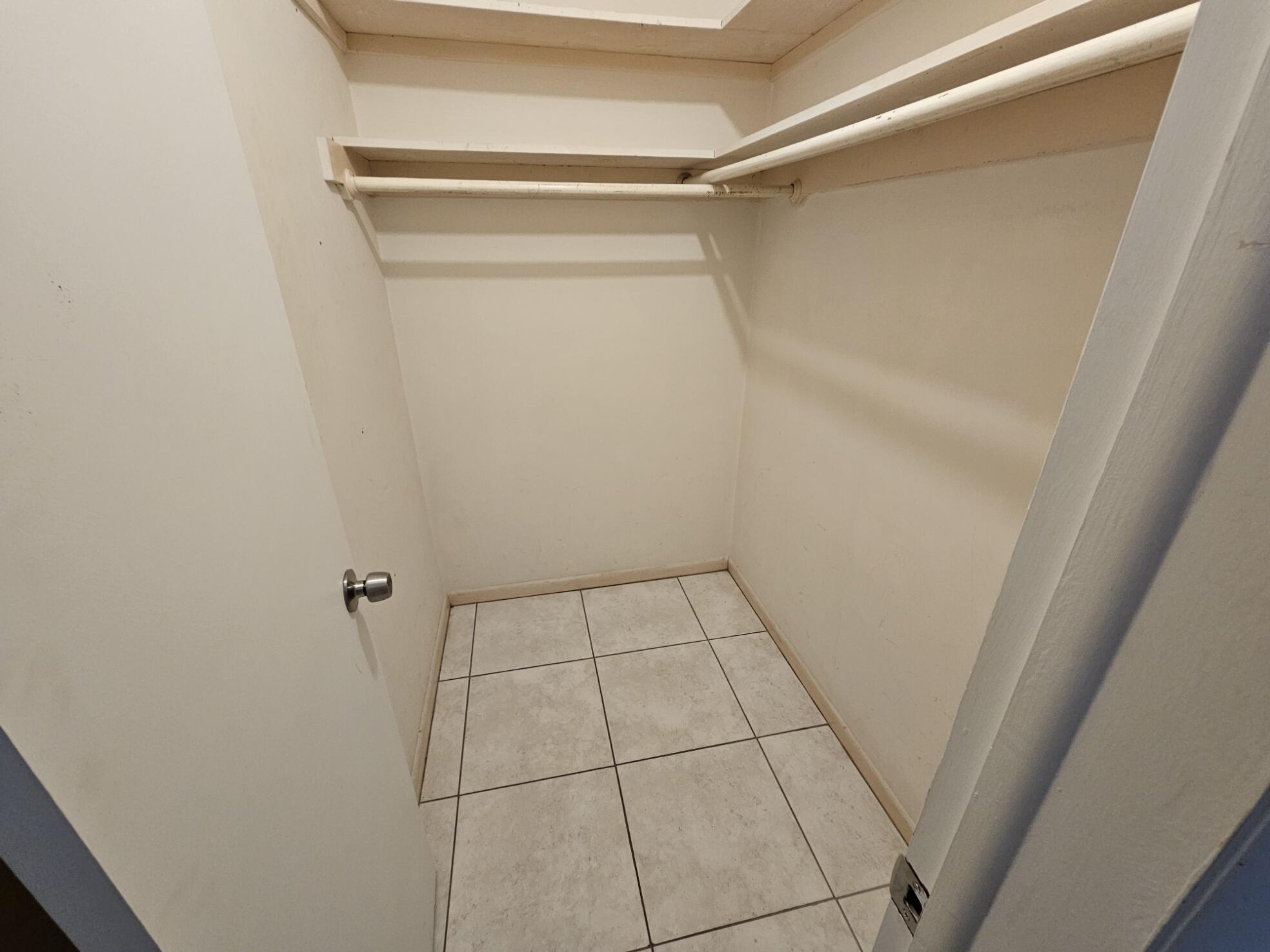722 Ridge Road, Unit 10 Lantana, FL 33462 - Photo 9 of 13 a view of an empty walk in closet