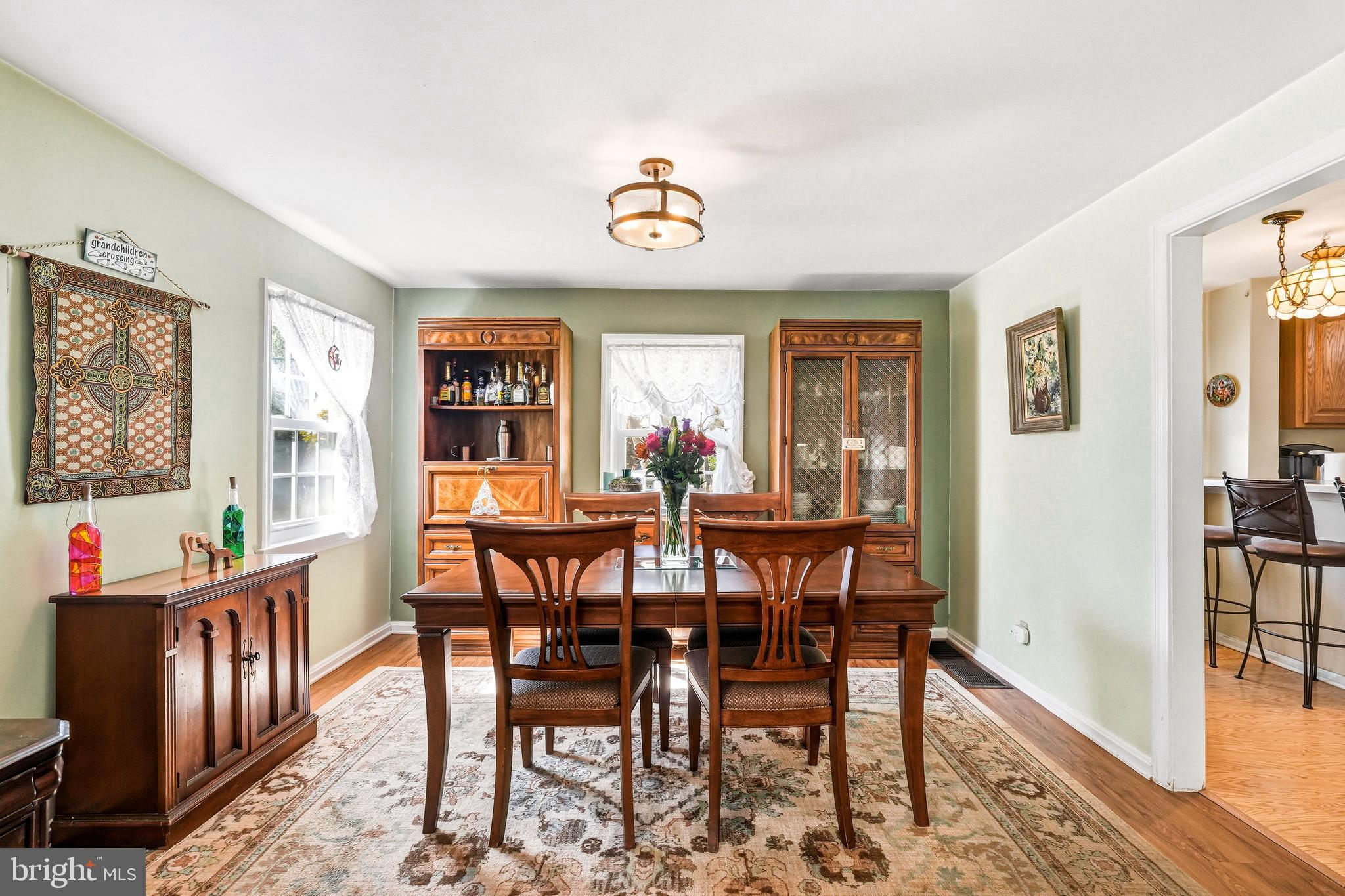 400 Witley Road Wynnewood, PA 19096 - Photo 13 of 38 a view of a dining room with furniture window and wooden floor