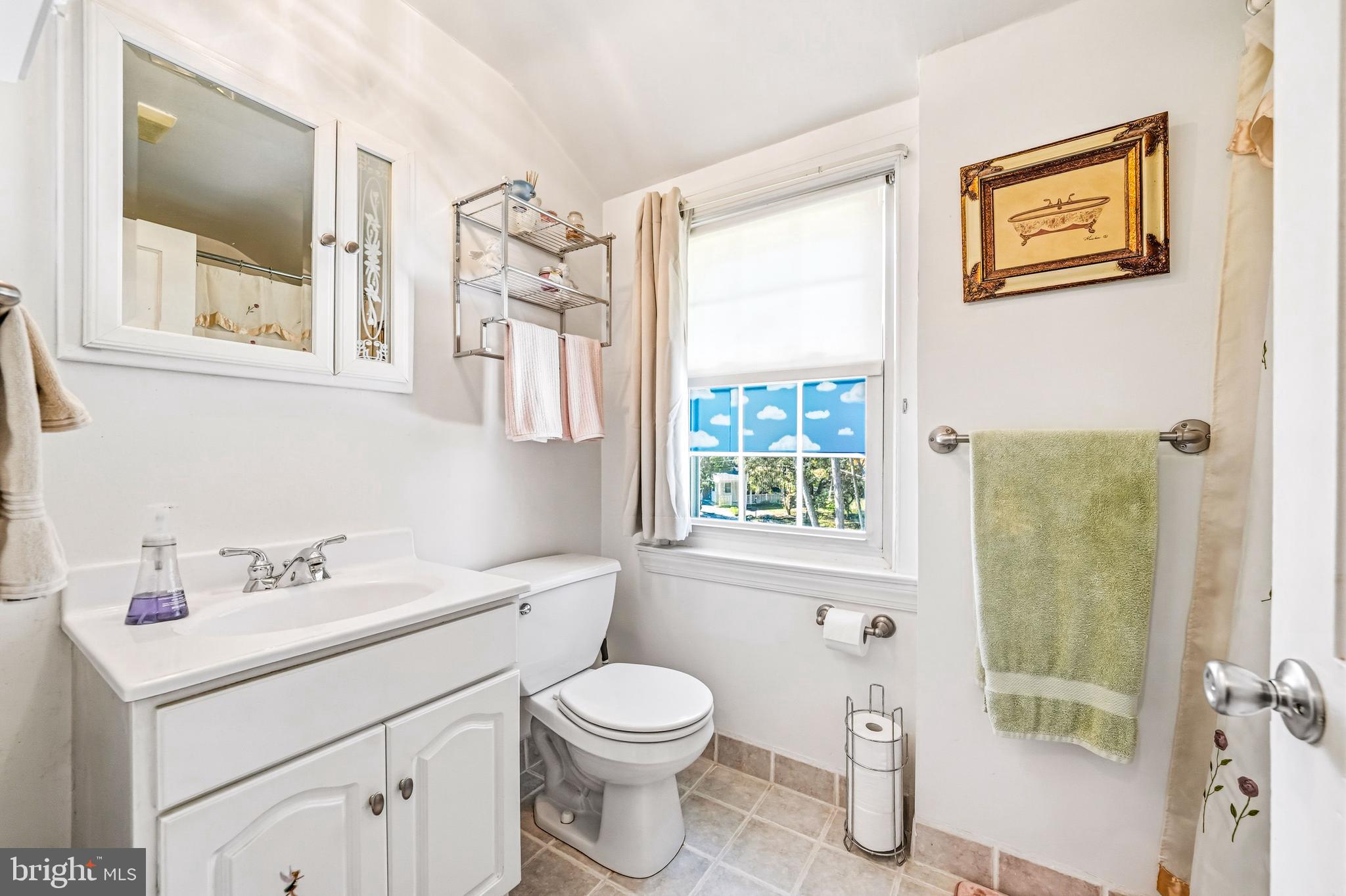 400 Witley Road Wynnewood, PA 19096 - Photo 22 of 38 a bathroom with a sink toilet and shower