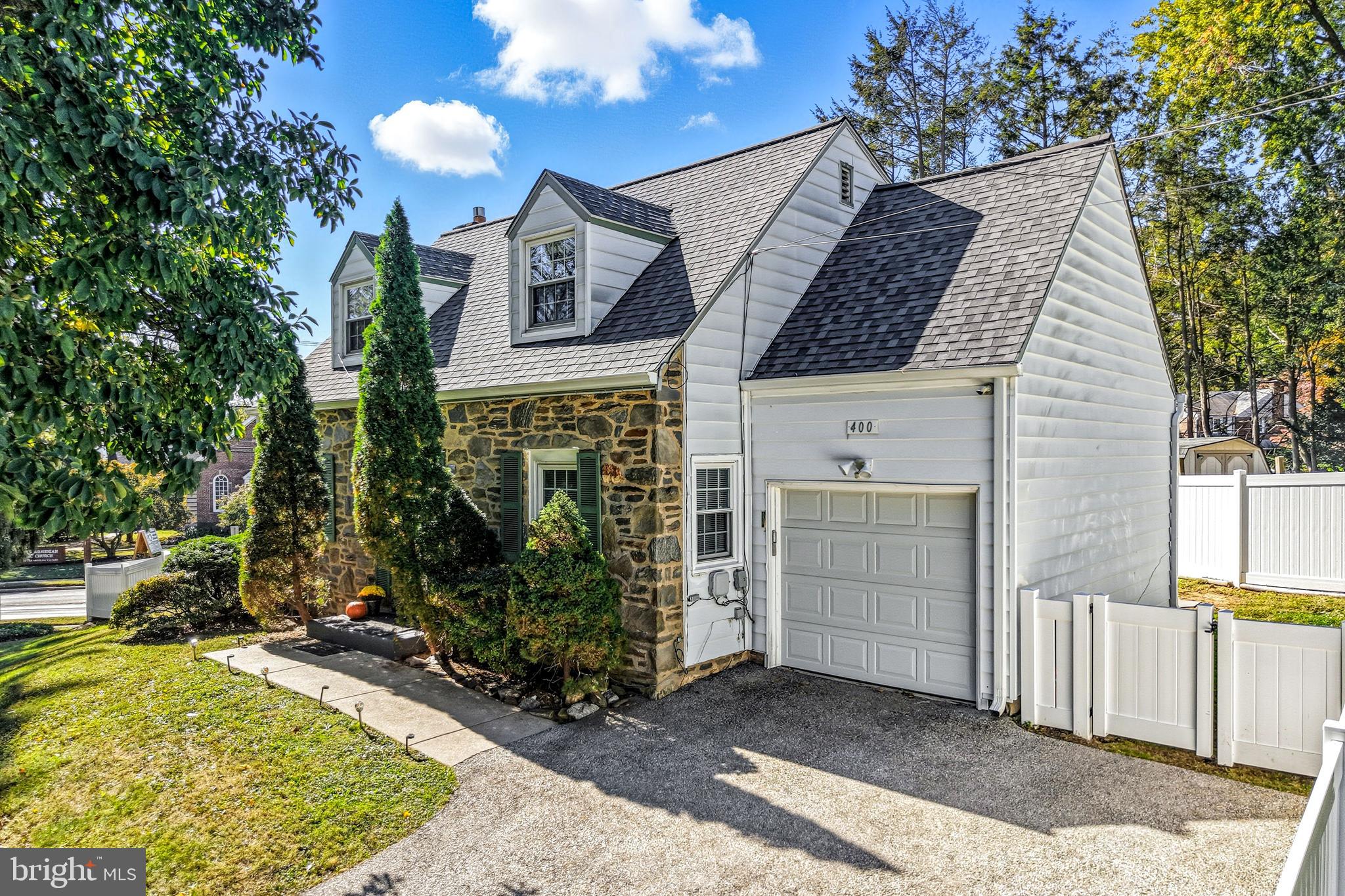 400 Witley Road Wynnewood, PA 19096 - Photo 3 of 38 a view of a house with a yard