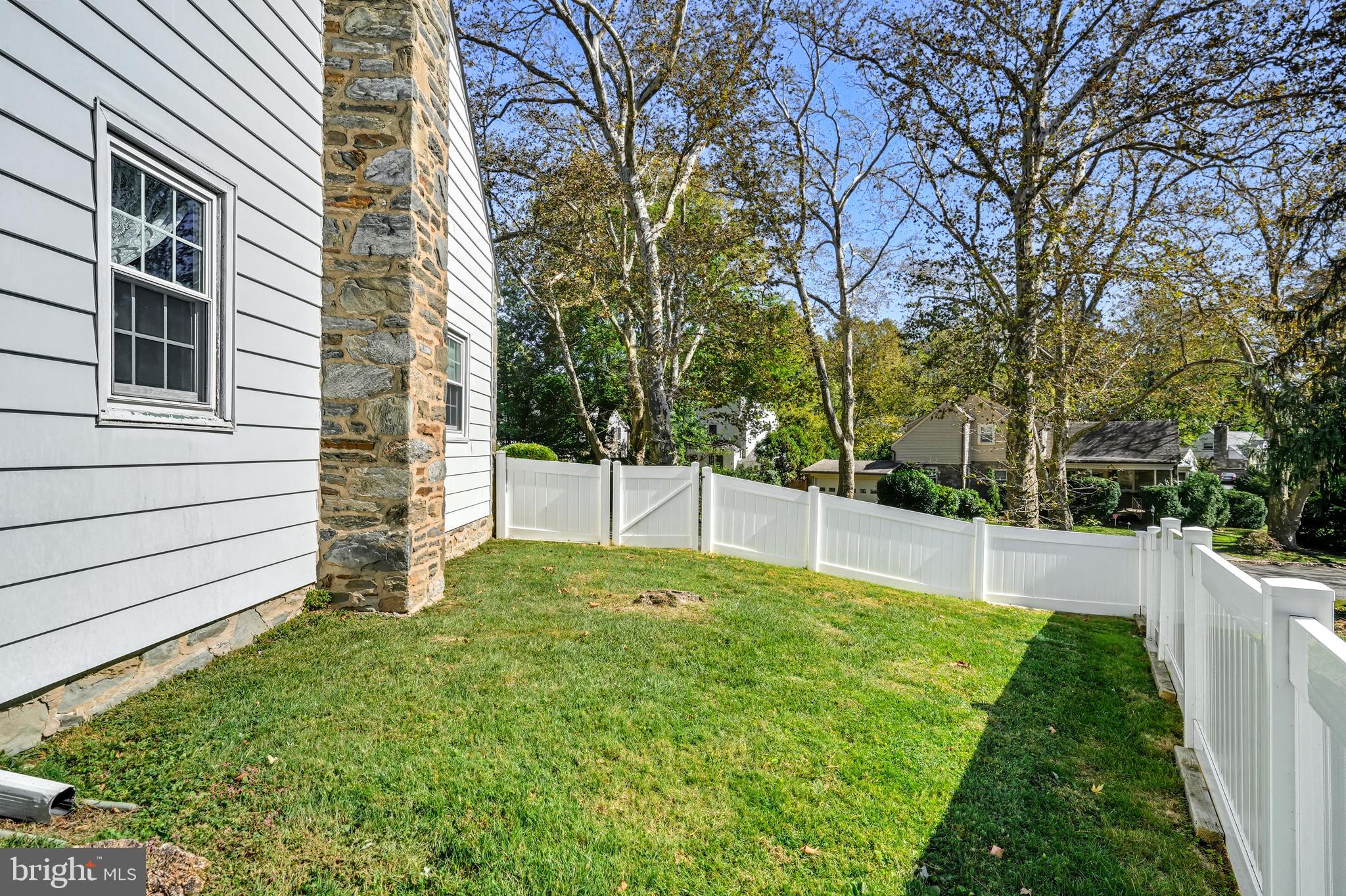 400 Witley Road Wynnewood, PA 19096 - Photo 32 of 38 a view of a backyard with large trees