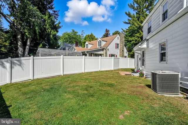 a house view with a backyard space