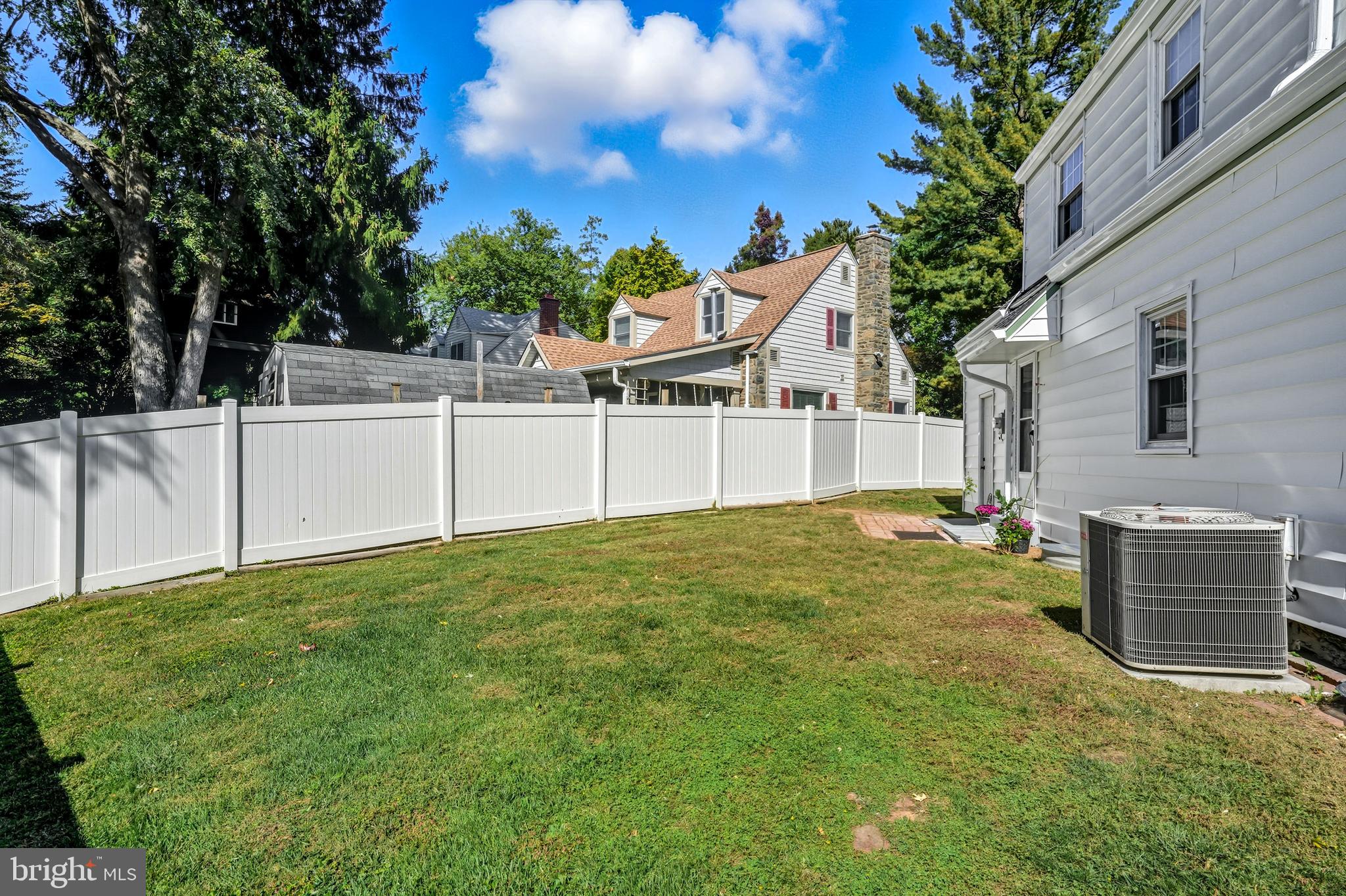 400 Witley Road Wynnewood, PA 19096 - Photo 33 of 38 a backyard of a house with table and chairs
