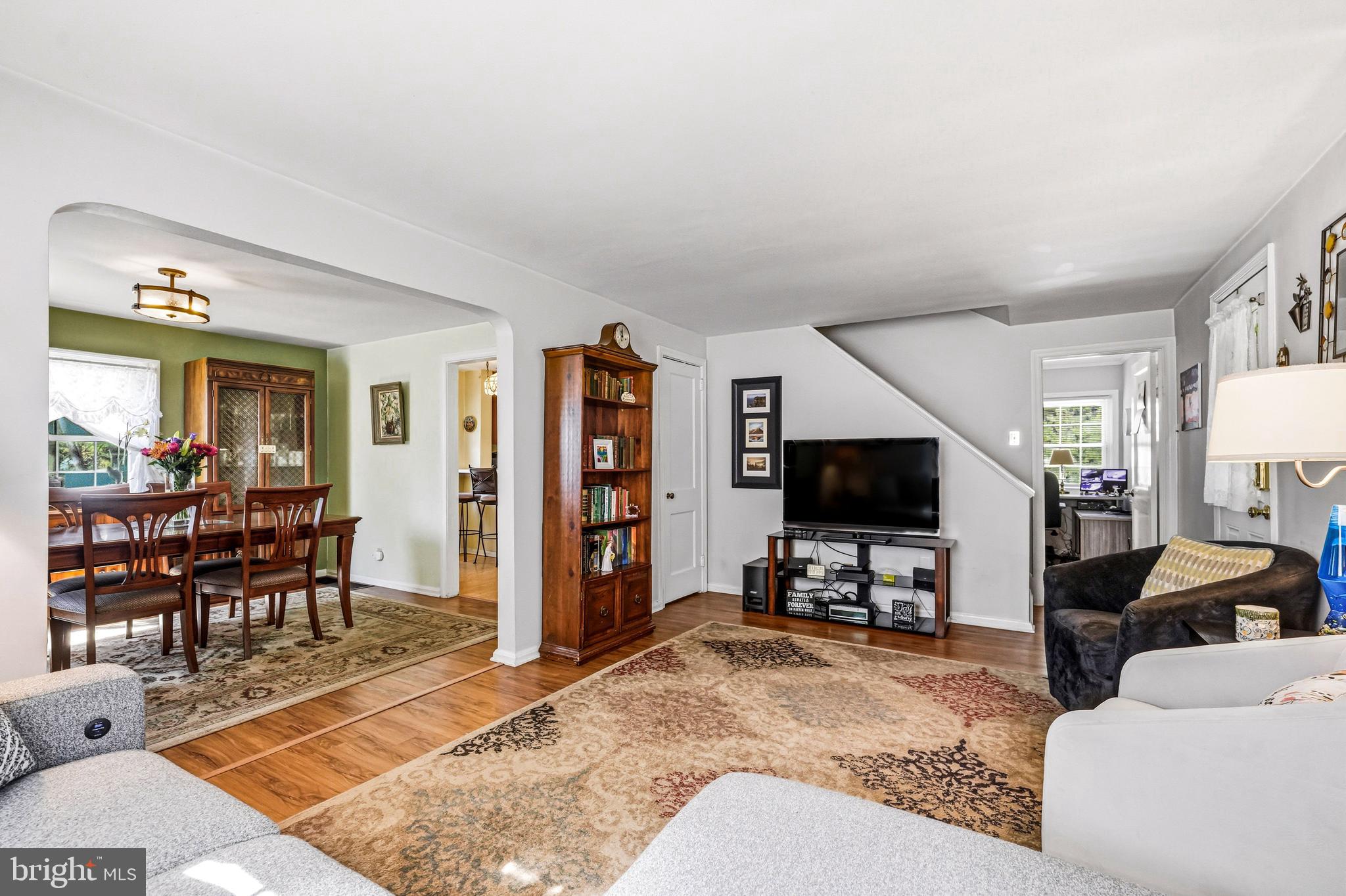 400 Witley Road Wynnewood, PA 19096 - Photo 8 of 38 a living room with furniture and a flat screen tv