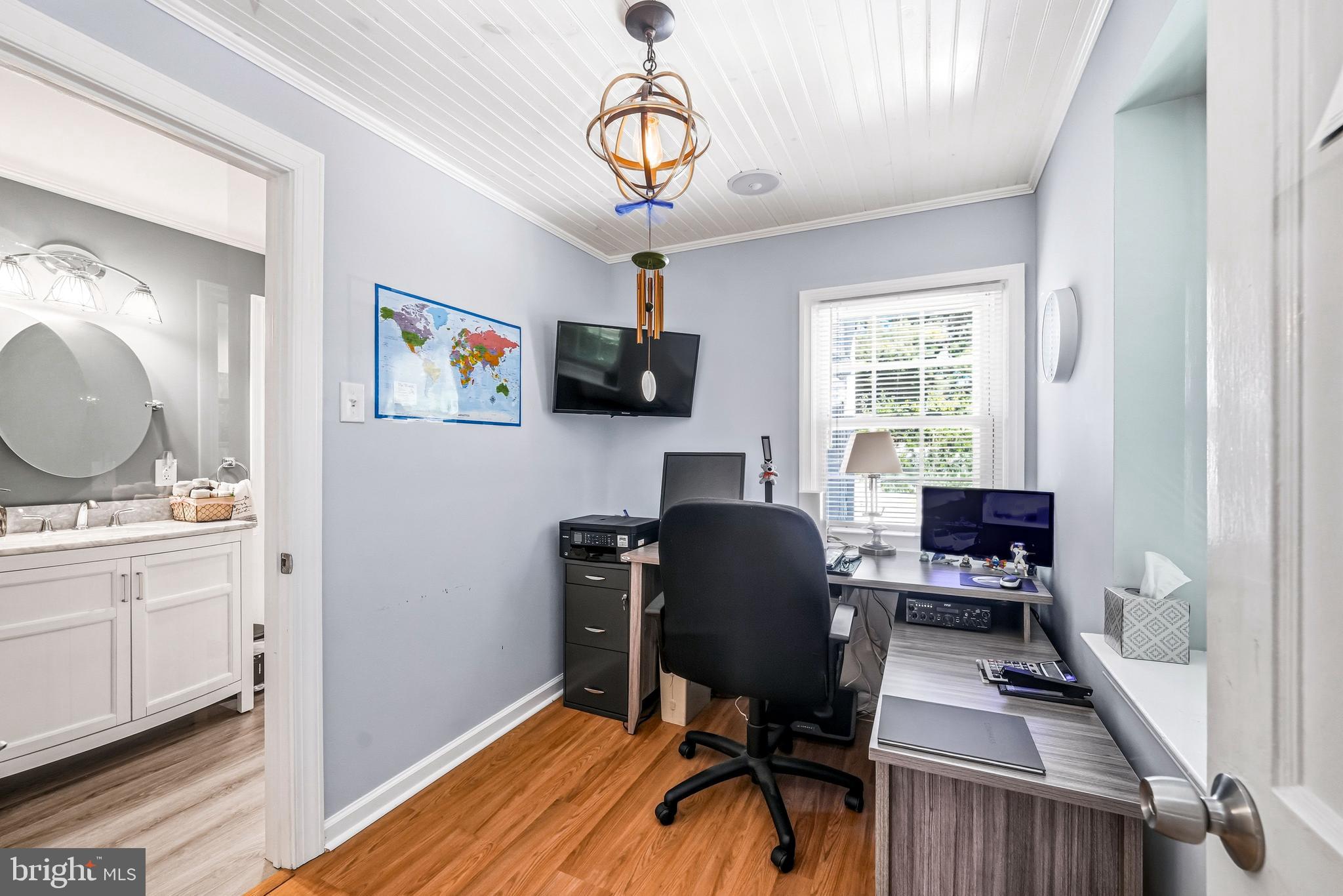 400 Witley Road Wynnewood, PA 19096 - Photo 10 of 38 a workspace with wooden floor