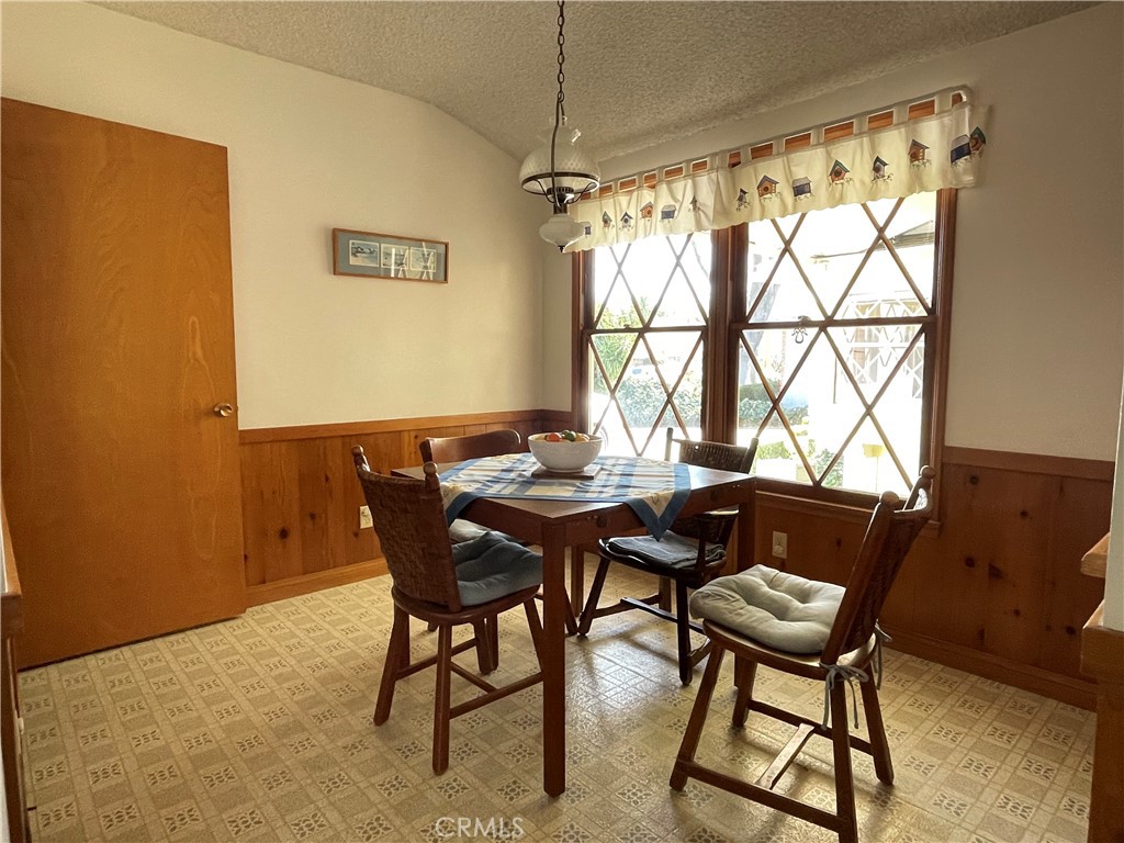 24935 Green Avenue Newhall, CA 91321 - Photo 5 of 11 a view of a dining room with furniture window and outside view