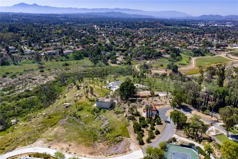 a view of a city with mountains in the background